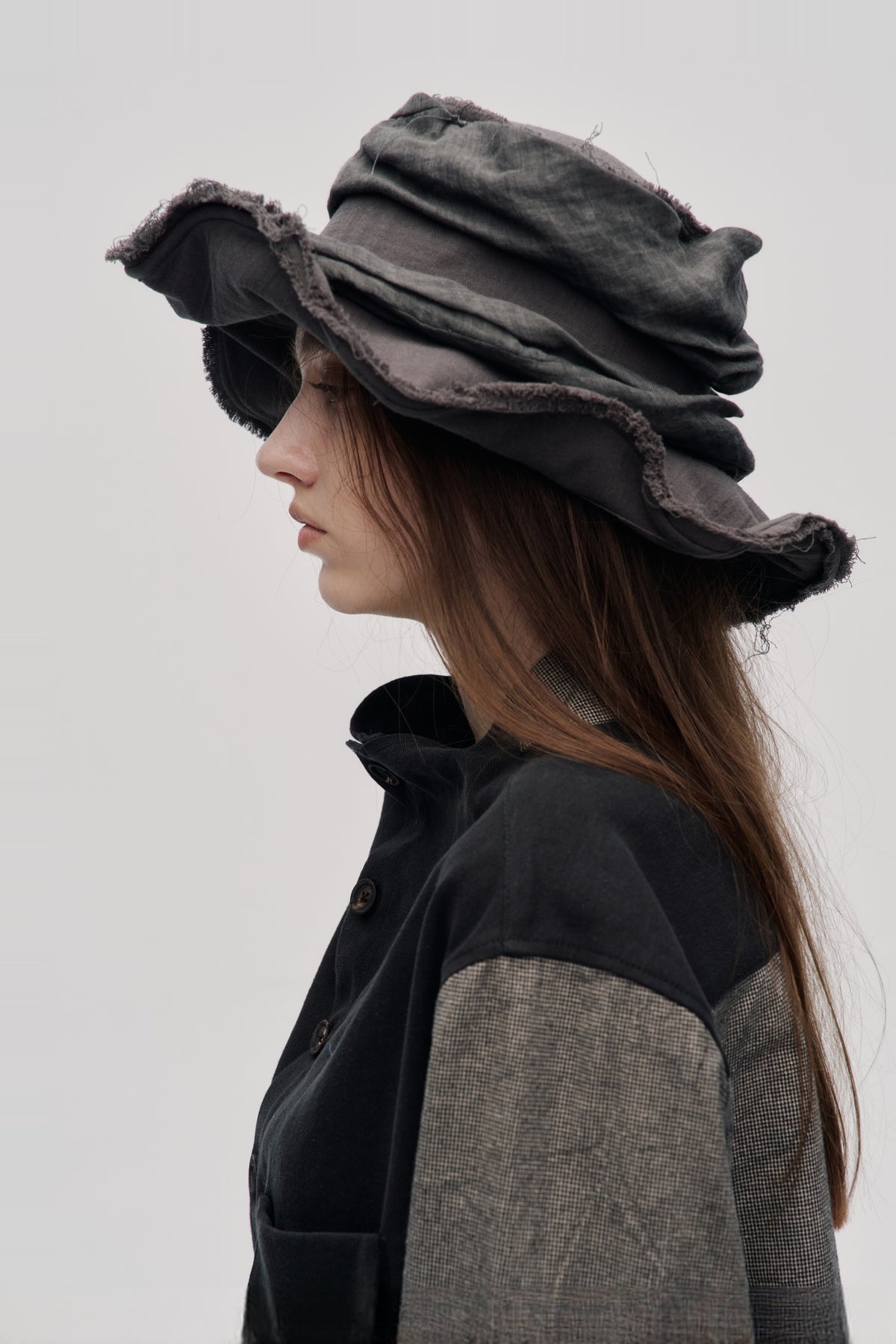 ILNya Nieternite Nifutur Frayed Raw-Edge Wide-Brim Structured Flat Top Hat — half body
