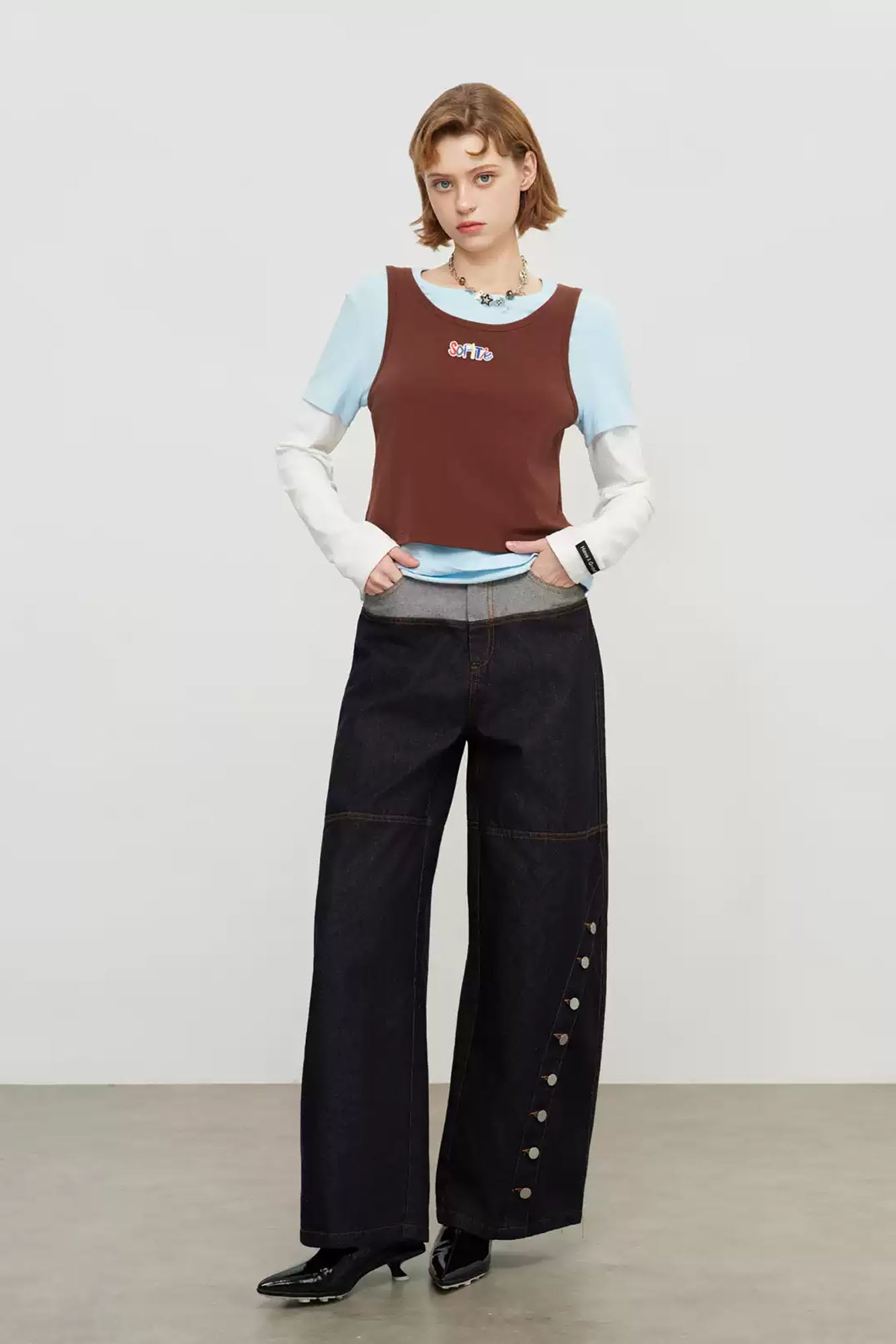 SOFITTE Contrast Waistband Asym Button Seam Raw Jeans