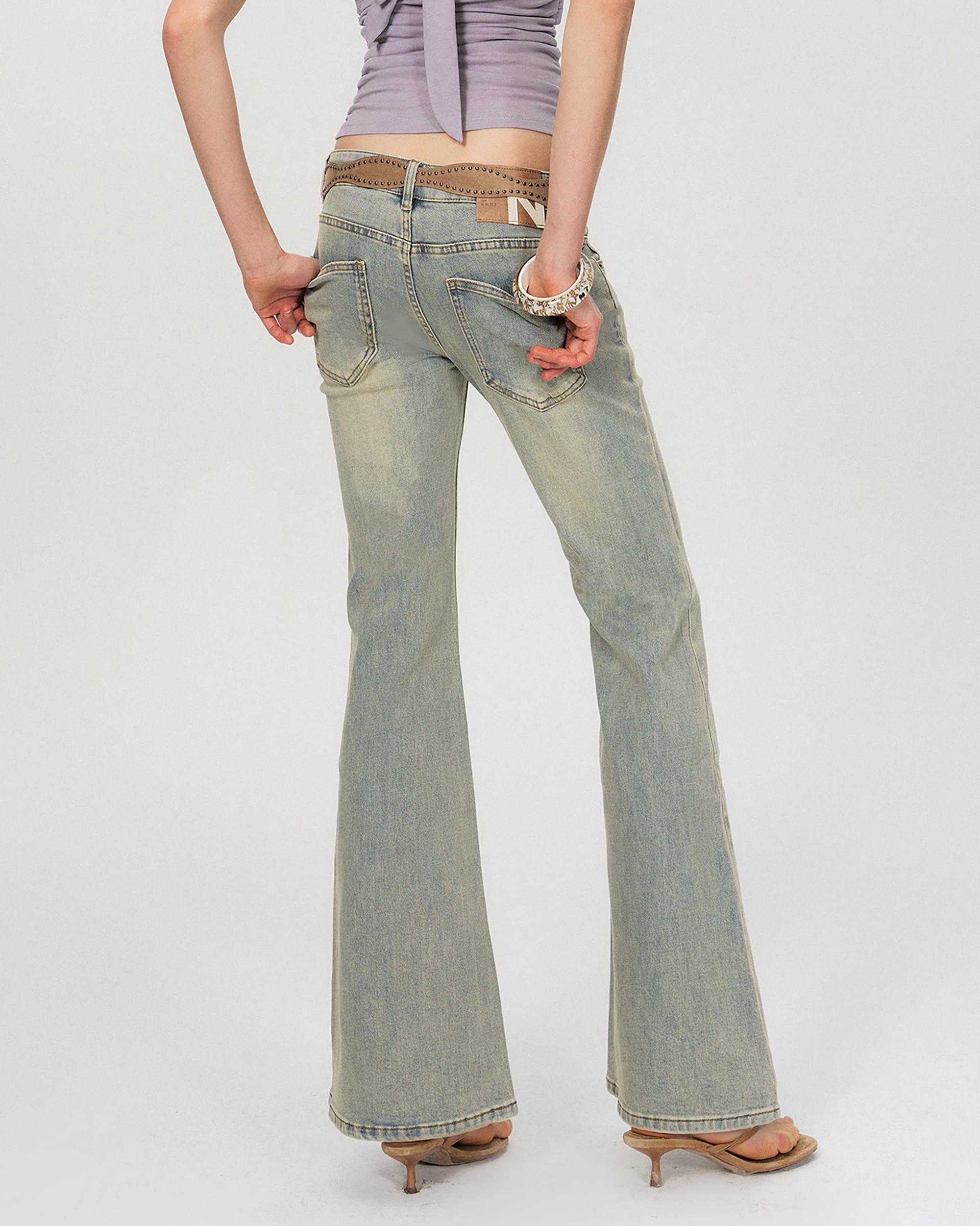THE NEVERMORE Washed Low-Rise Flared Jeans