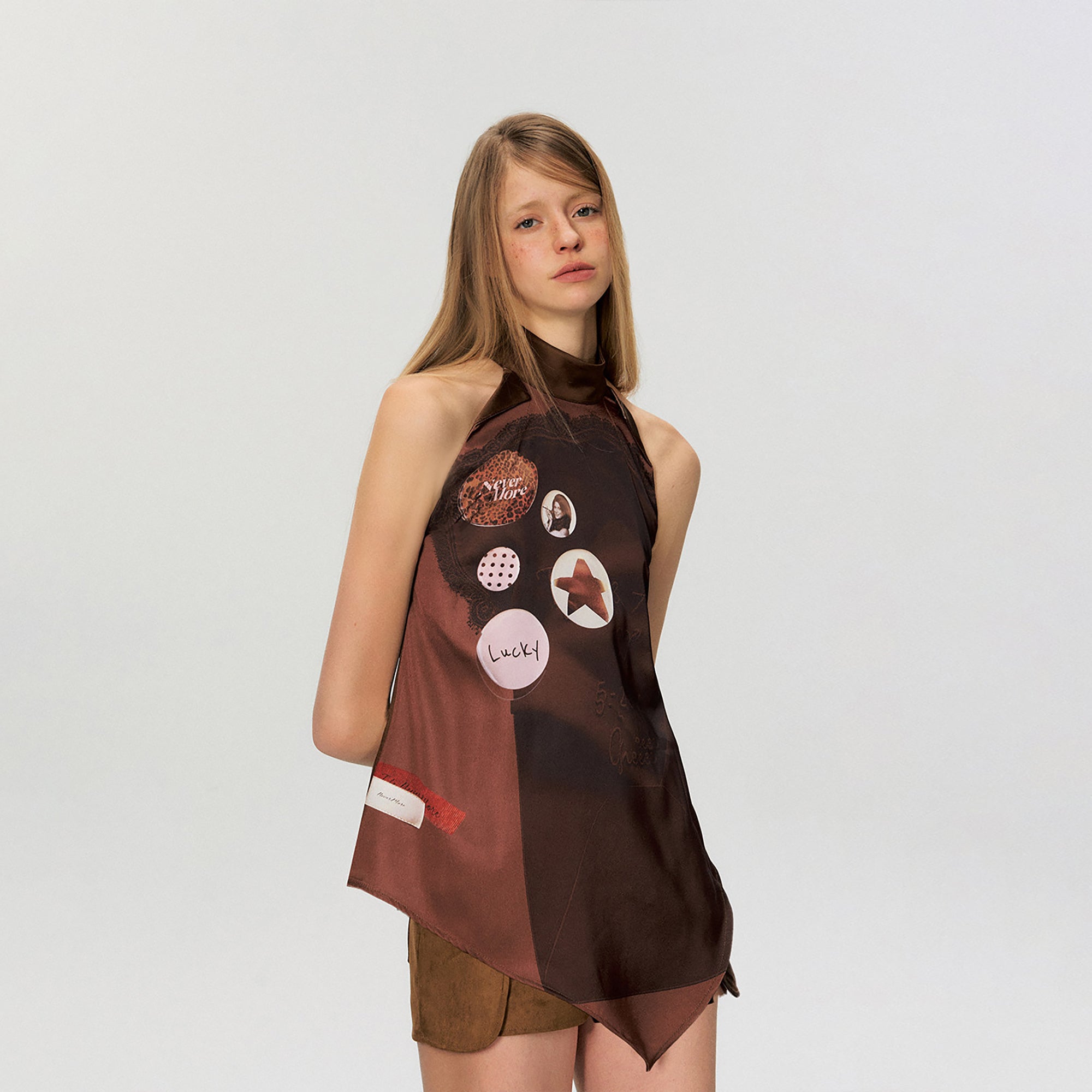 THE NEVERMORE Asym Hem Flip-Collar Graphics Sleeveless Top