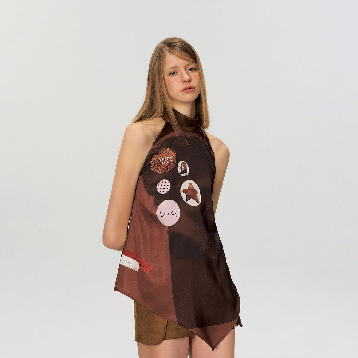 THE NEVERMORE Asym Hem Flip-Collar Graphics Sleeveless Top