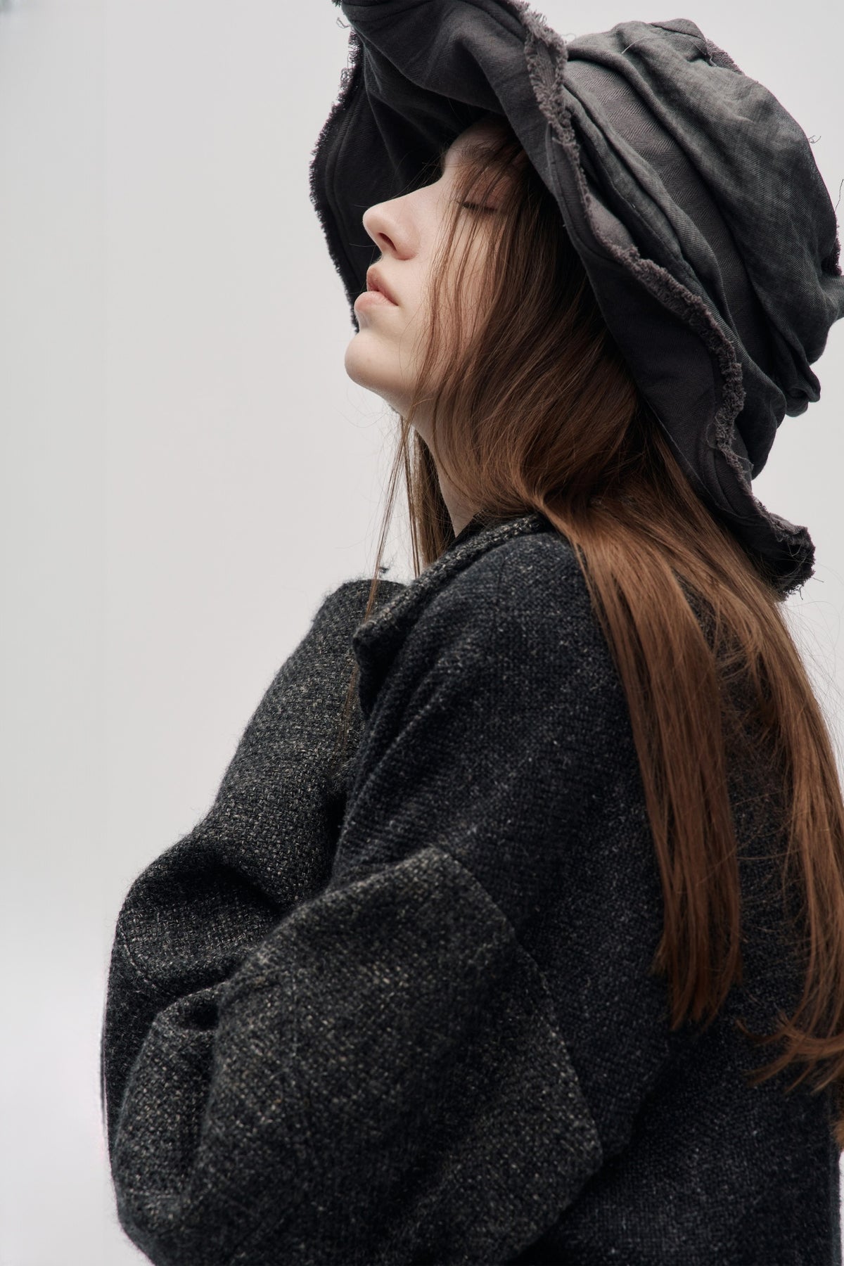 ILNya Nieternite Nifutur Frayed Raw-Edge Wide-Brim Structured Flat Top Hat — half body