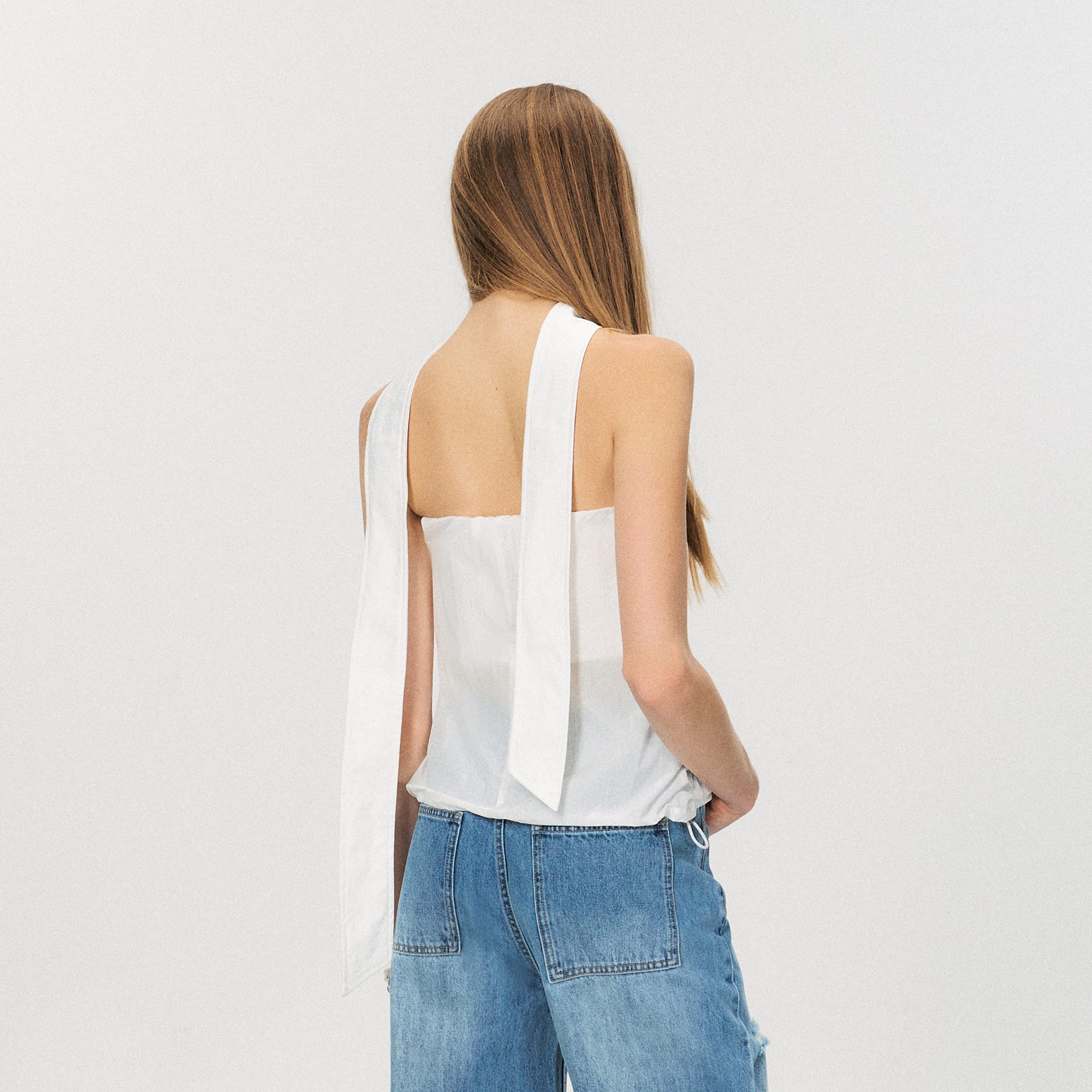 THE NEVERMORE Sheer Strapless Drawstring-Hem Pocket Top