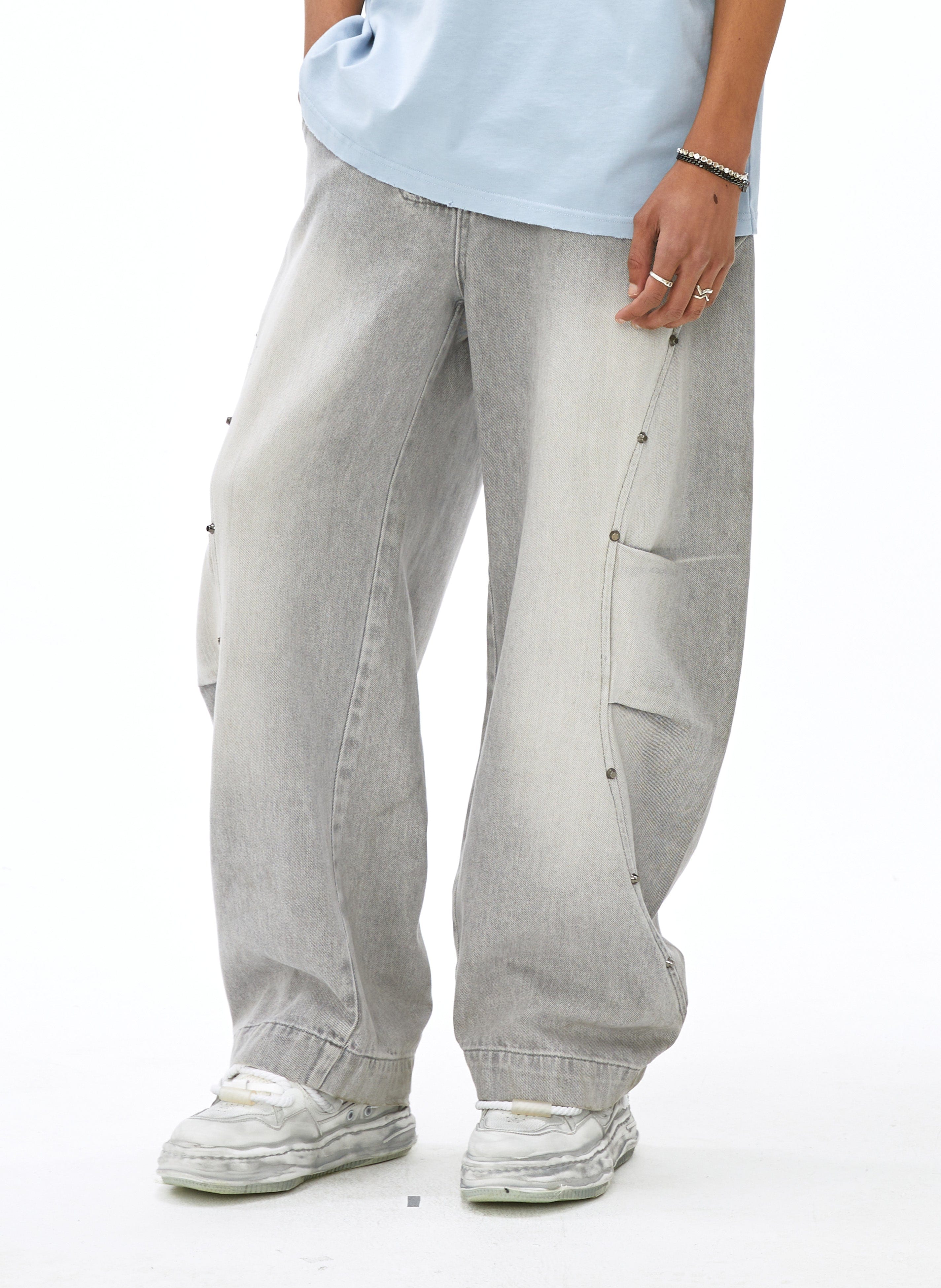 VANN VALRENCE Washed Riveted Curved-Seam Denim Pants, premium urban and streetwear designers apparel on PROJECTISR.com, VANN VALRENCE