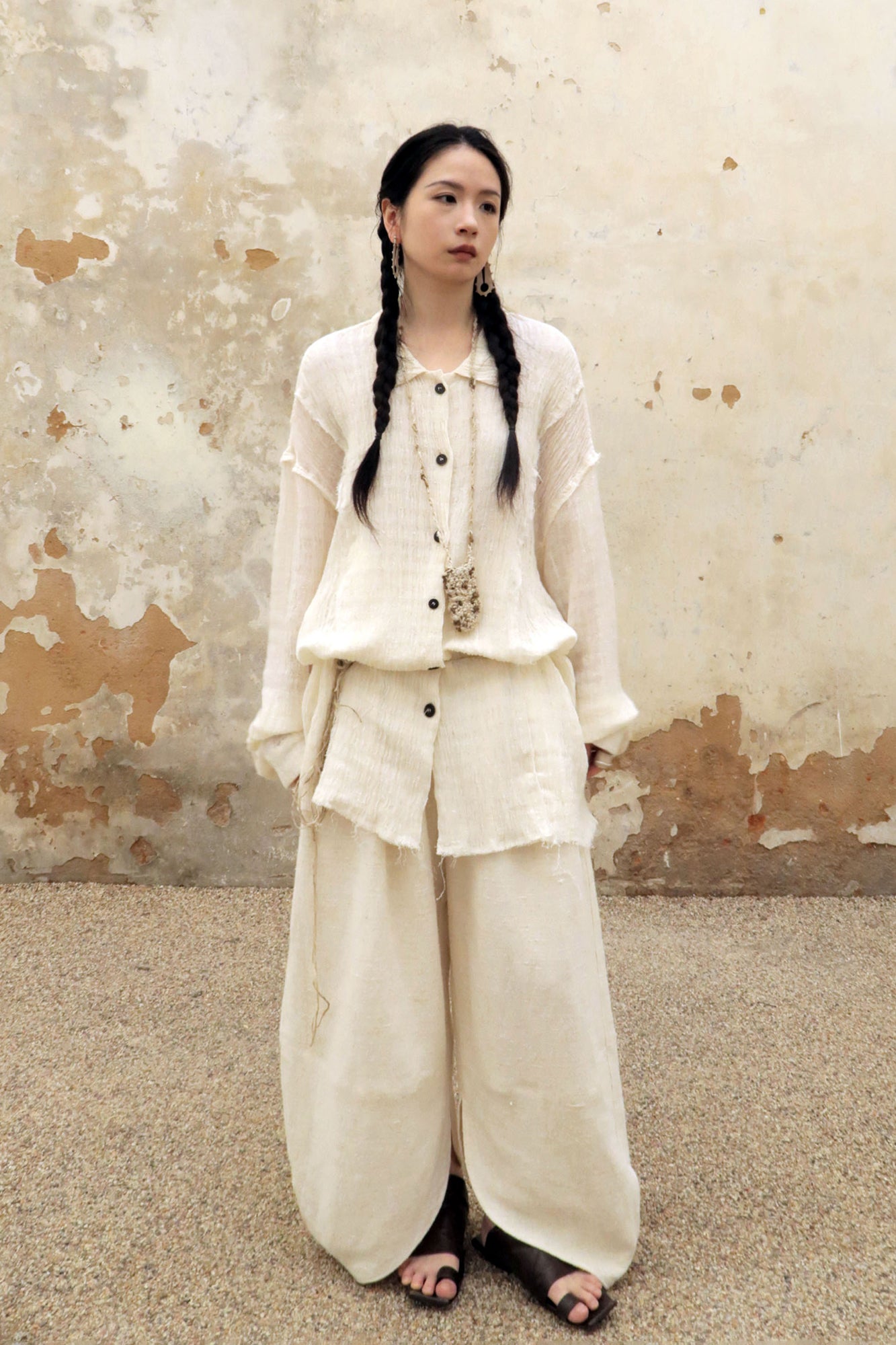 INCH LIM Pleated Split-Hem Curved-Leg Pants
