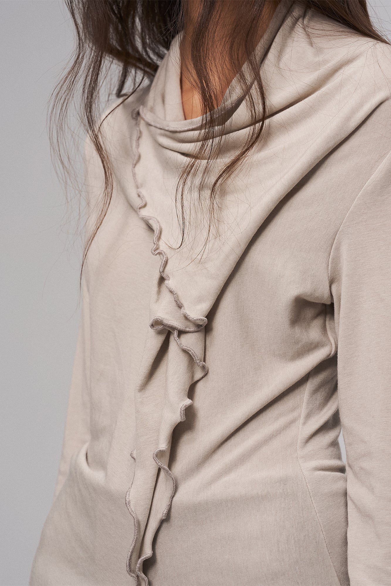 ILNya Nieternite Nifutur Asymmetrical Ruffle Wool-Blend Long Sleeve Tee