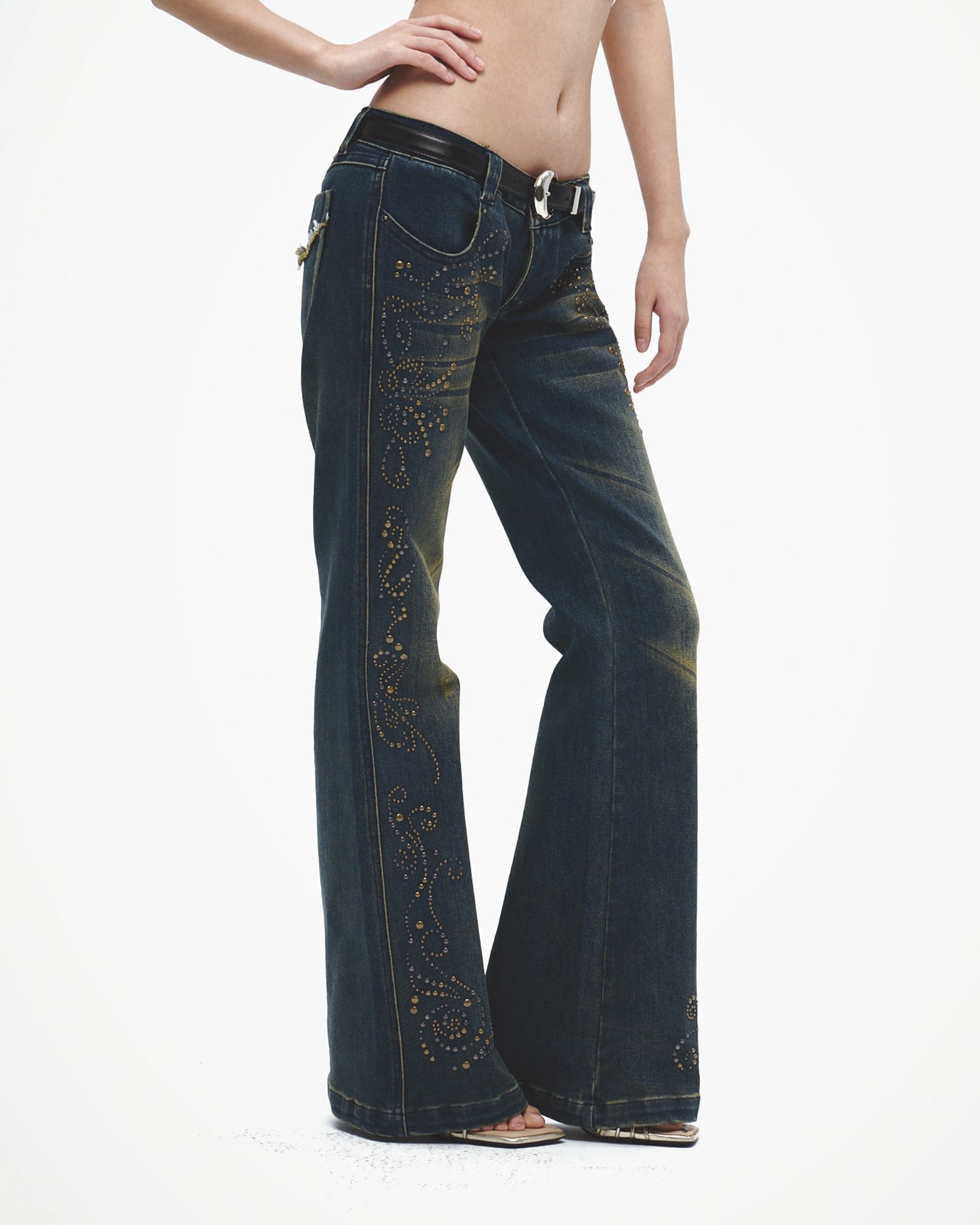 FAYCHUI Distressed Rivet Embellished Flared Jeans