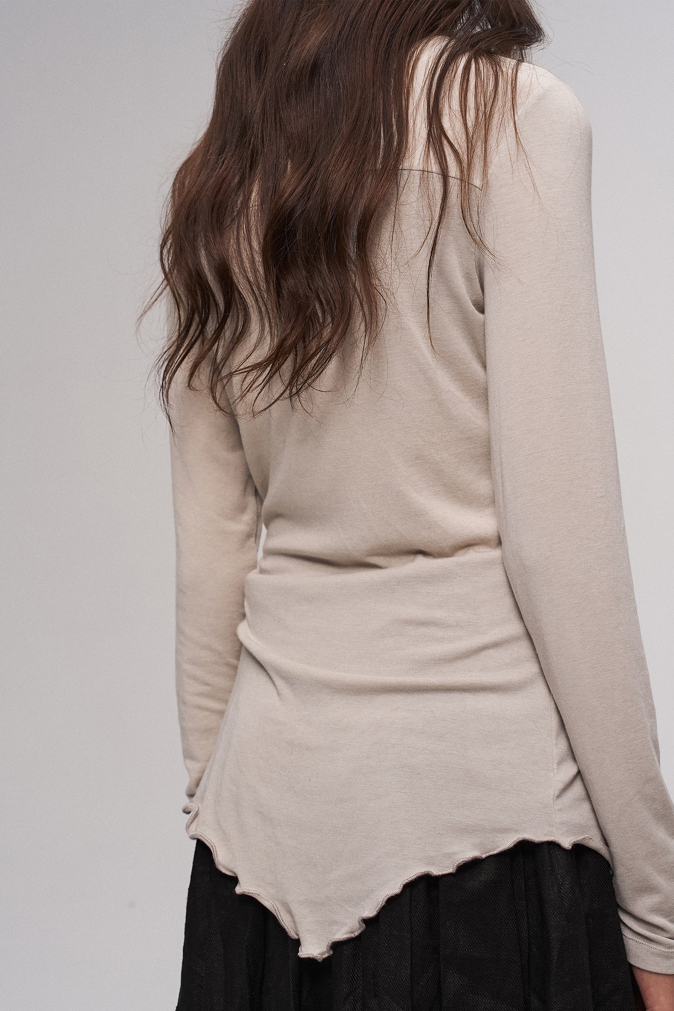 ILNya Nieternite Nifutur Asymmetrical Ruffle Wool-Blend Long Sleeve Tee