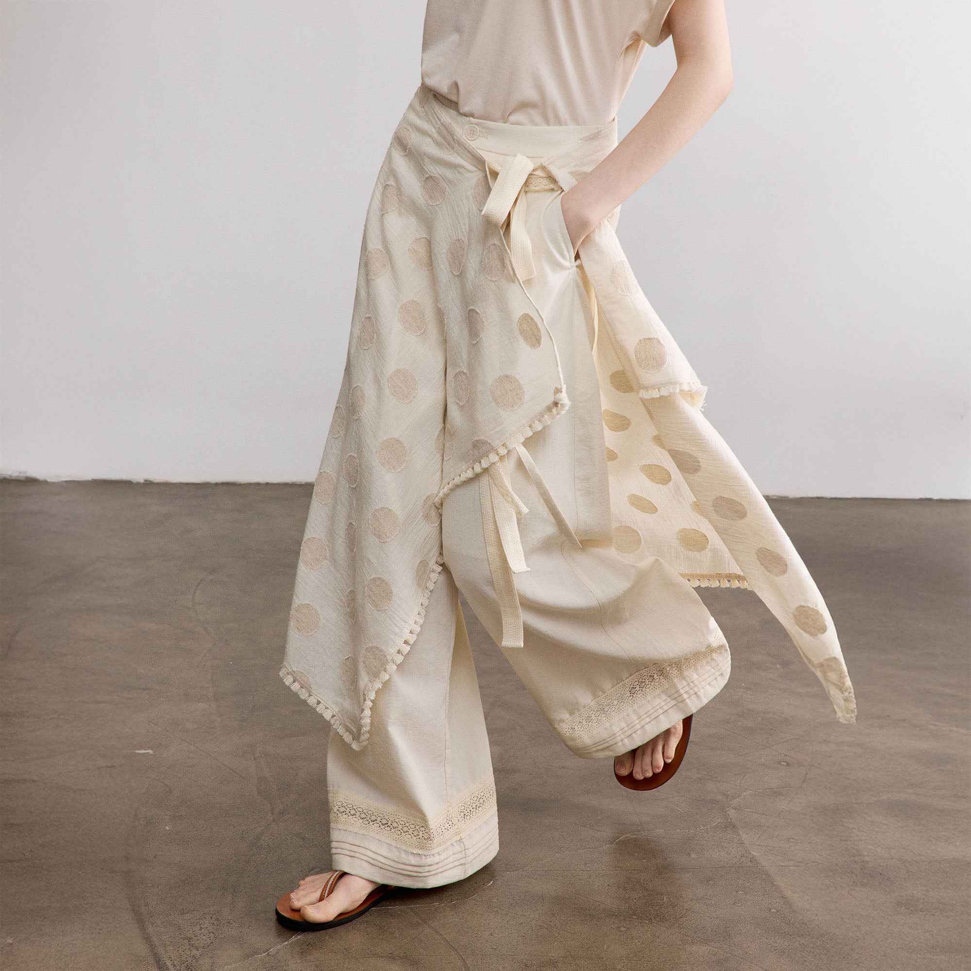 SAME FLOW Asymmetrical Dot Fringe-Trim Tie Skirt