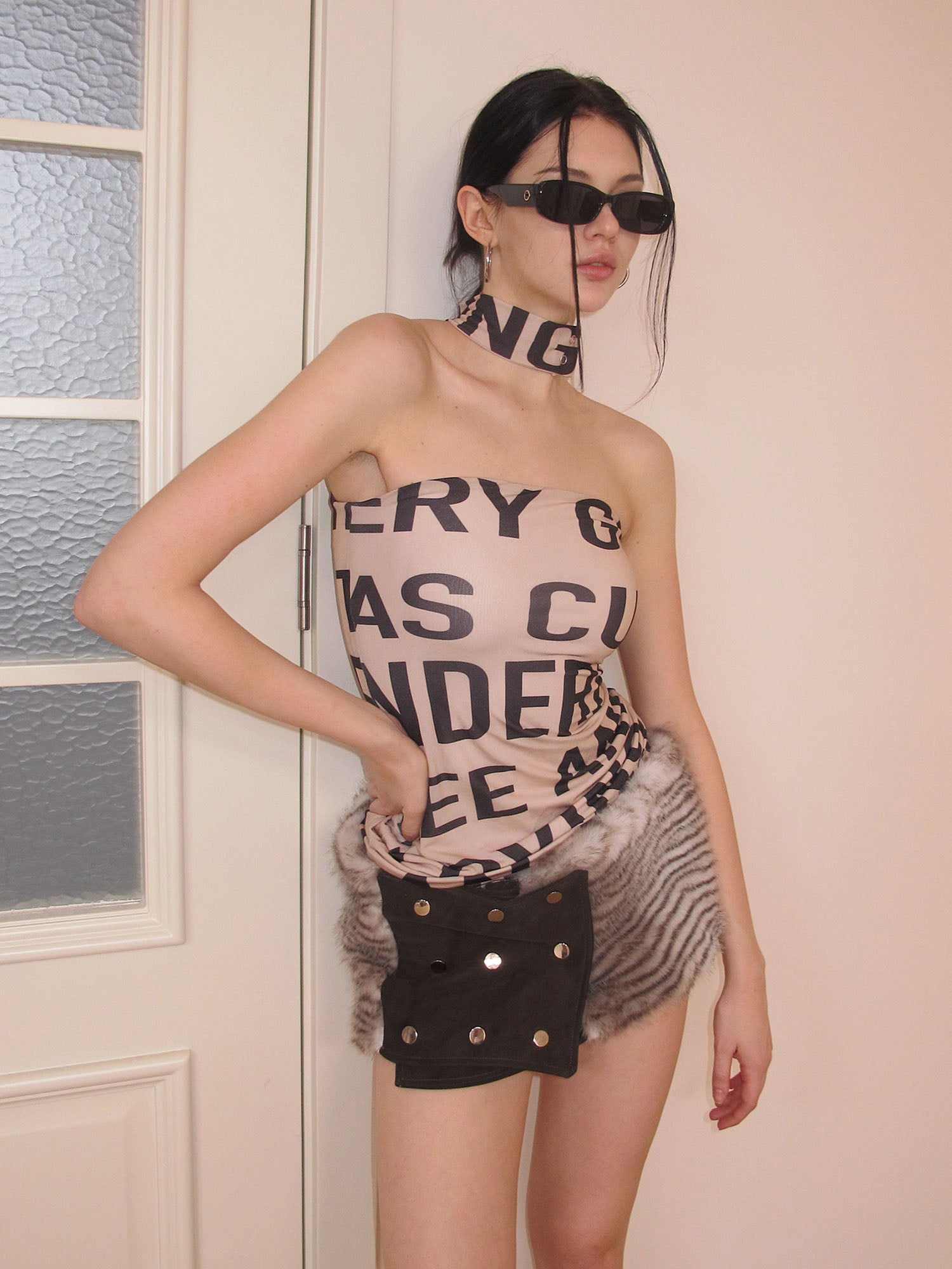 AE30 SAINT Faux Fur Snap Mini Skirt