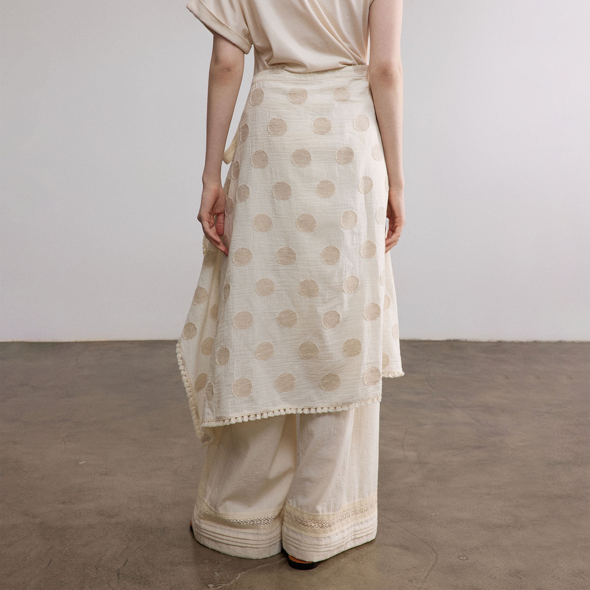 SAME FLOW Asymmetrical Dot Fringe-Trim Tie Skirt