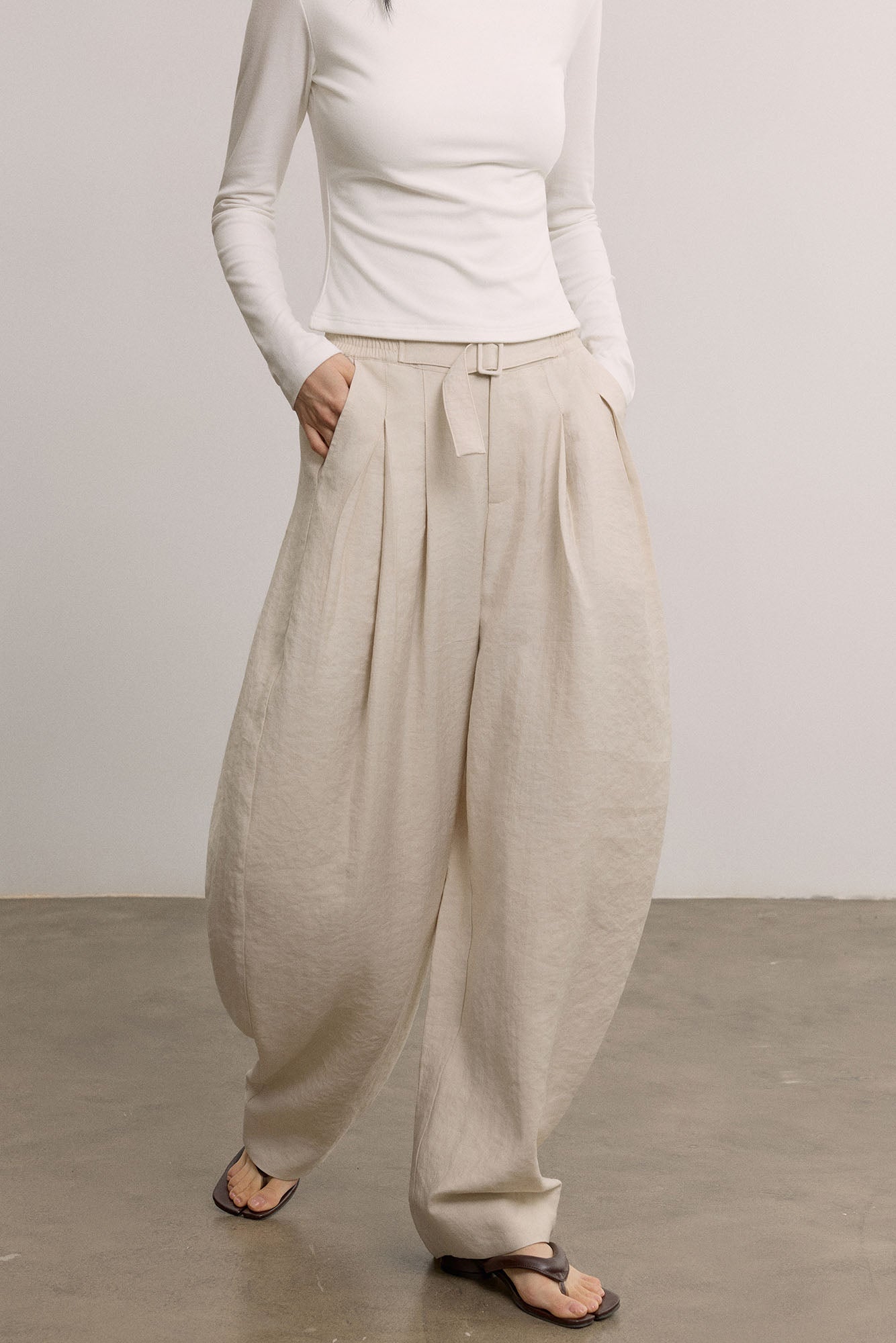 SAME FLOW Belted Pleated Oversized Barrel Pants