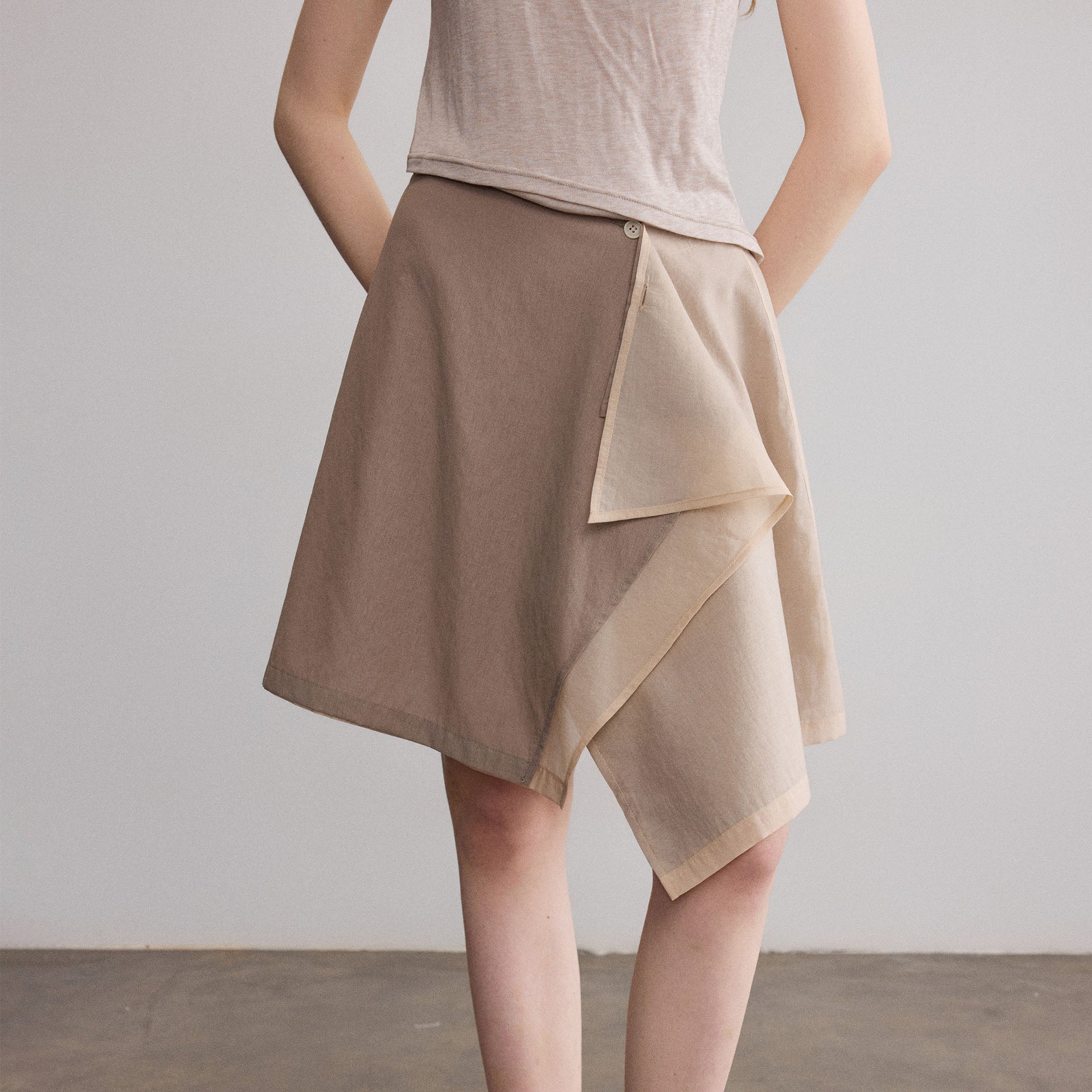 SAME FLOW Asymmetrical Layered Mini Skirt