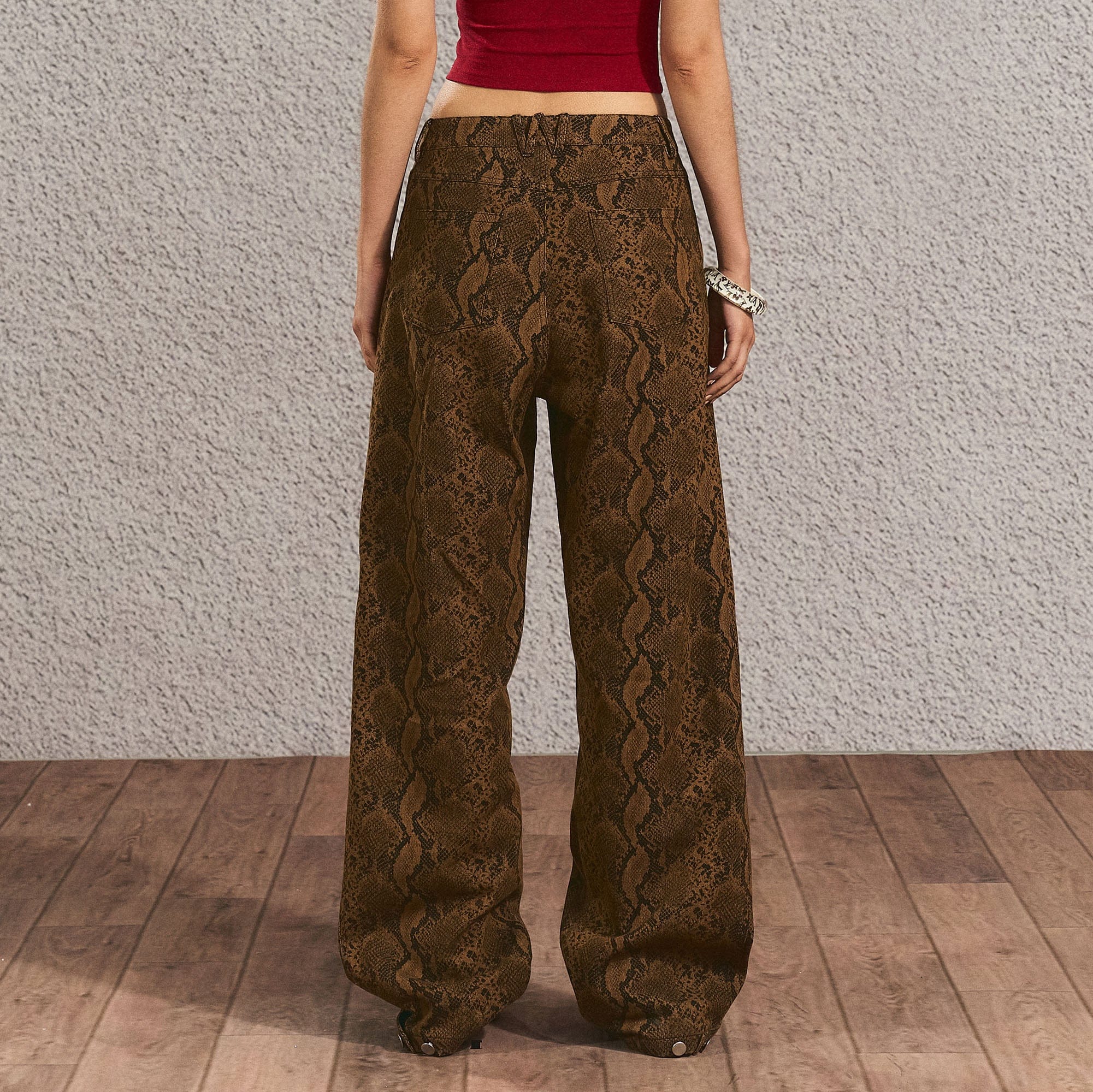 THE NEVERMORE Serpentine Buckled Wide-Leg Pants