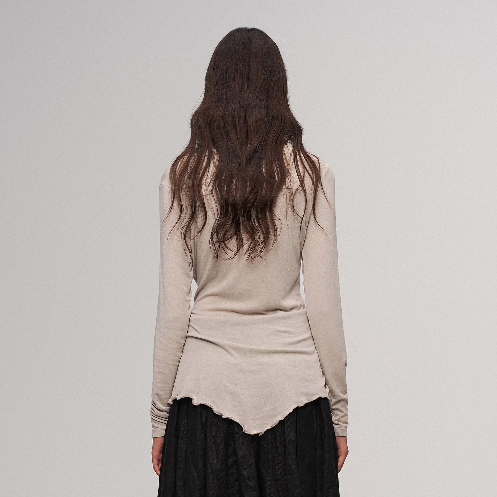 ILNya Nieternite Nifutur Asymmetrical Ruffle Wool-Blend Long Sleeve Tee