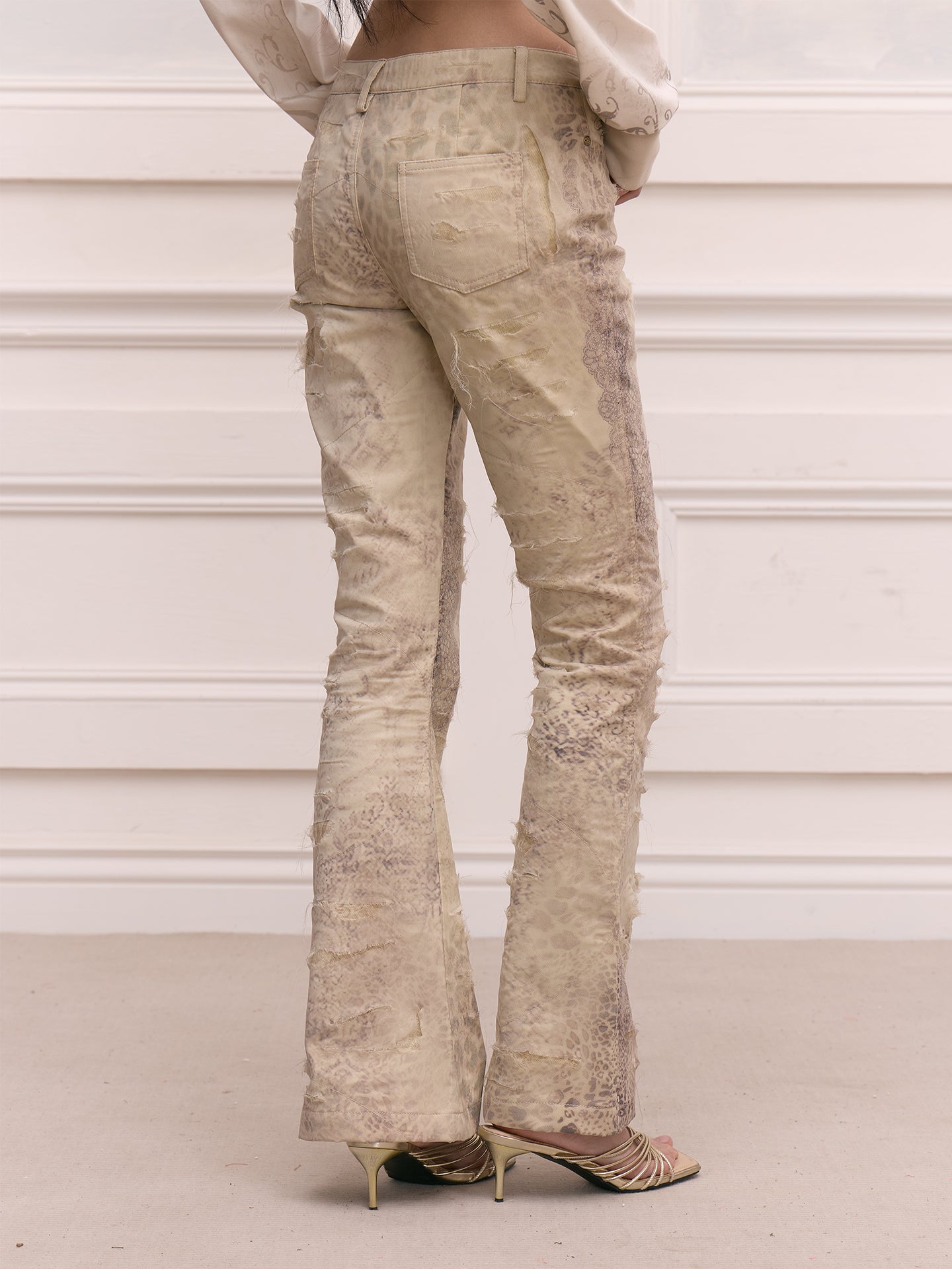 FAYCHUI Distressed Leopard Slim Flared Pants