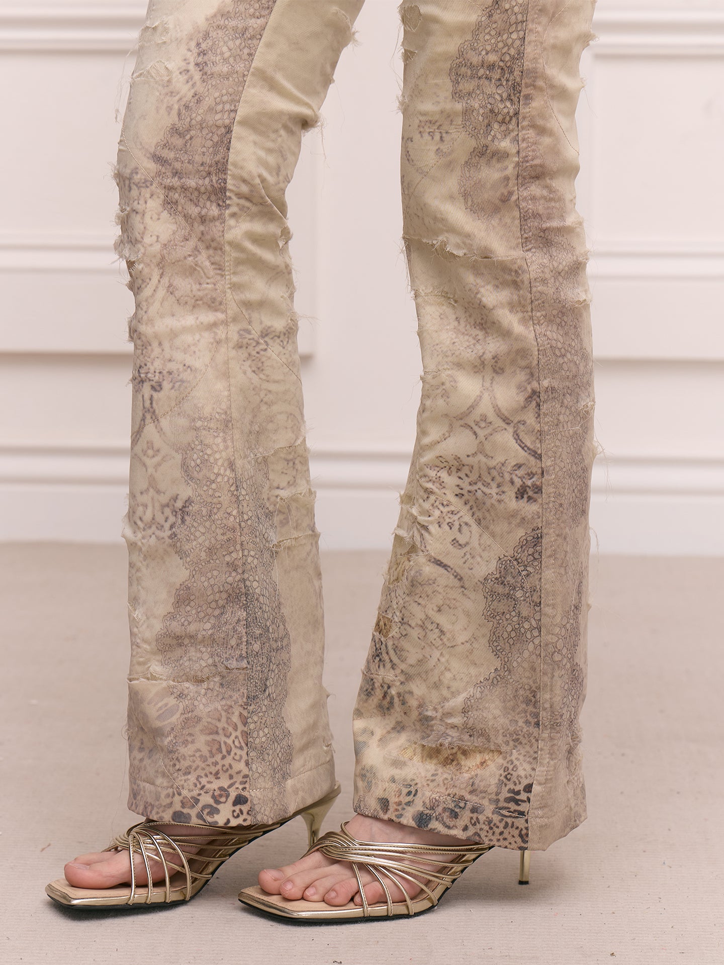 FAYCHUI Distressed Leopard Slim Flared Pants