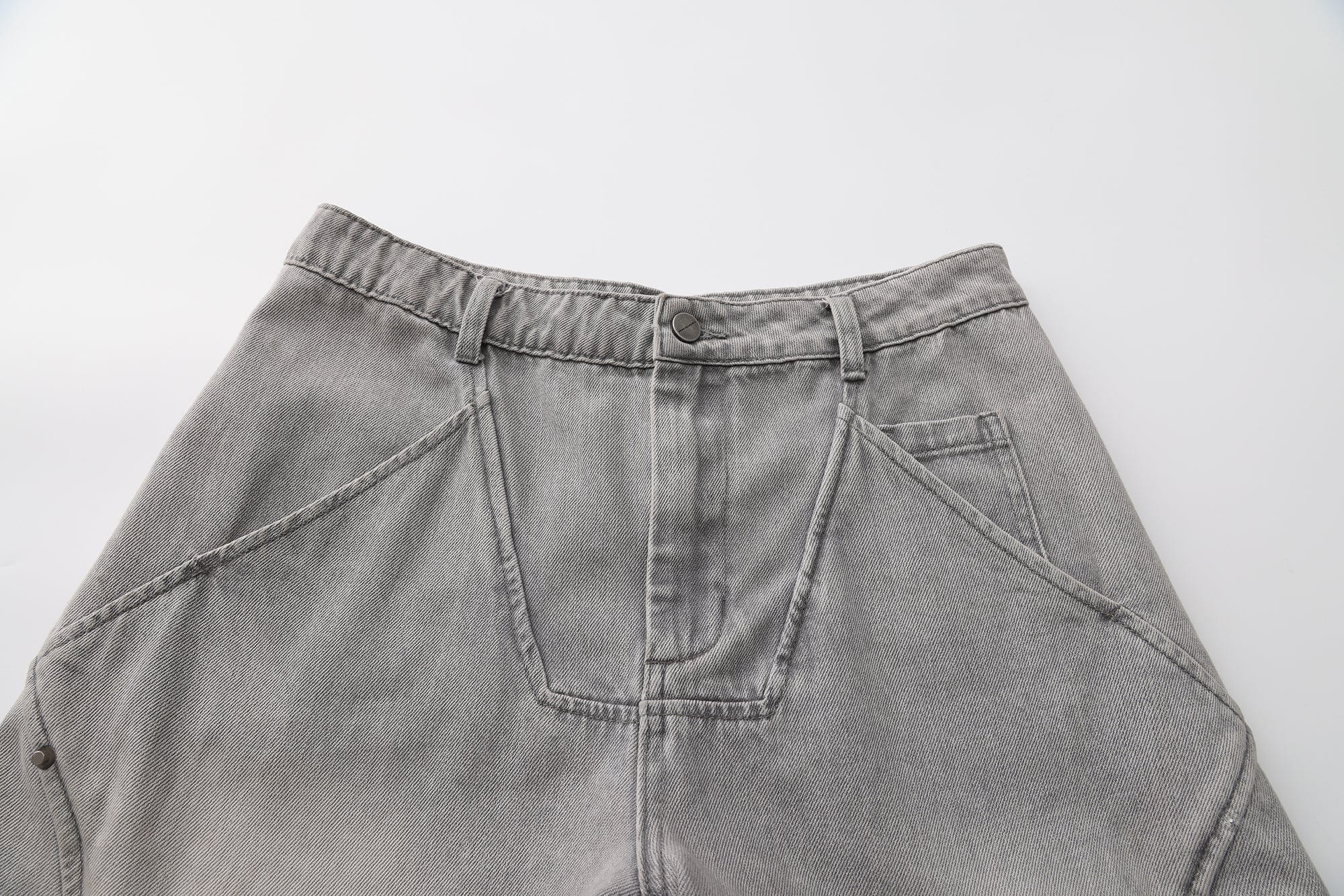 VANN VALRENCE Washed Riveted Curved-Seam Denim Pants, premium urban and streetwear designers apparel on PROJECTISR.com, VANN VALRENCE