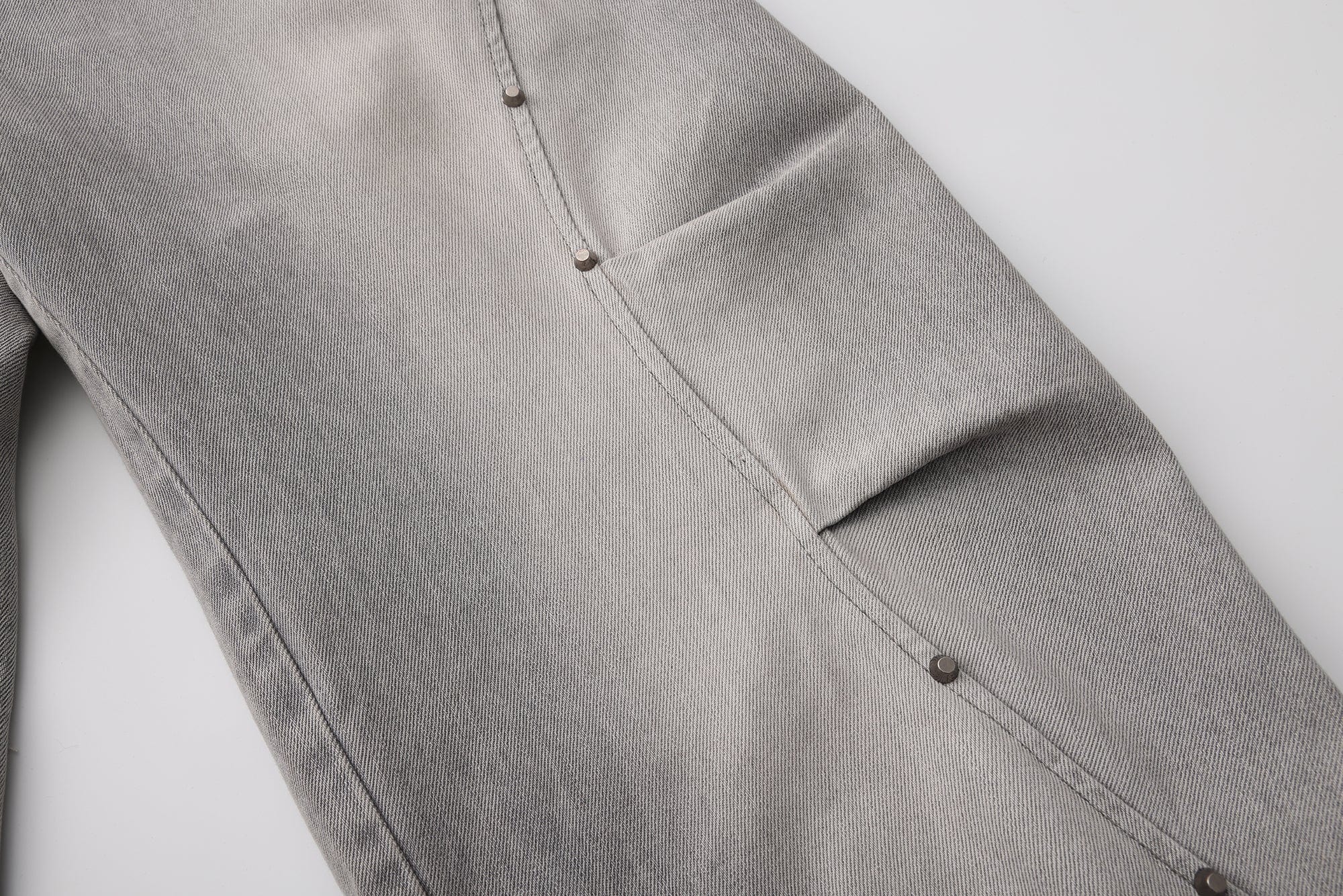 VANN VALRENCE Washed Riveted Curved-Seam Denim Pants, premium urban and streetwear designers apparel on PROJECTISR.com, VANN VALRENCE