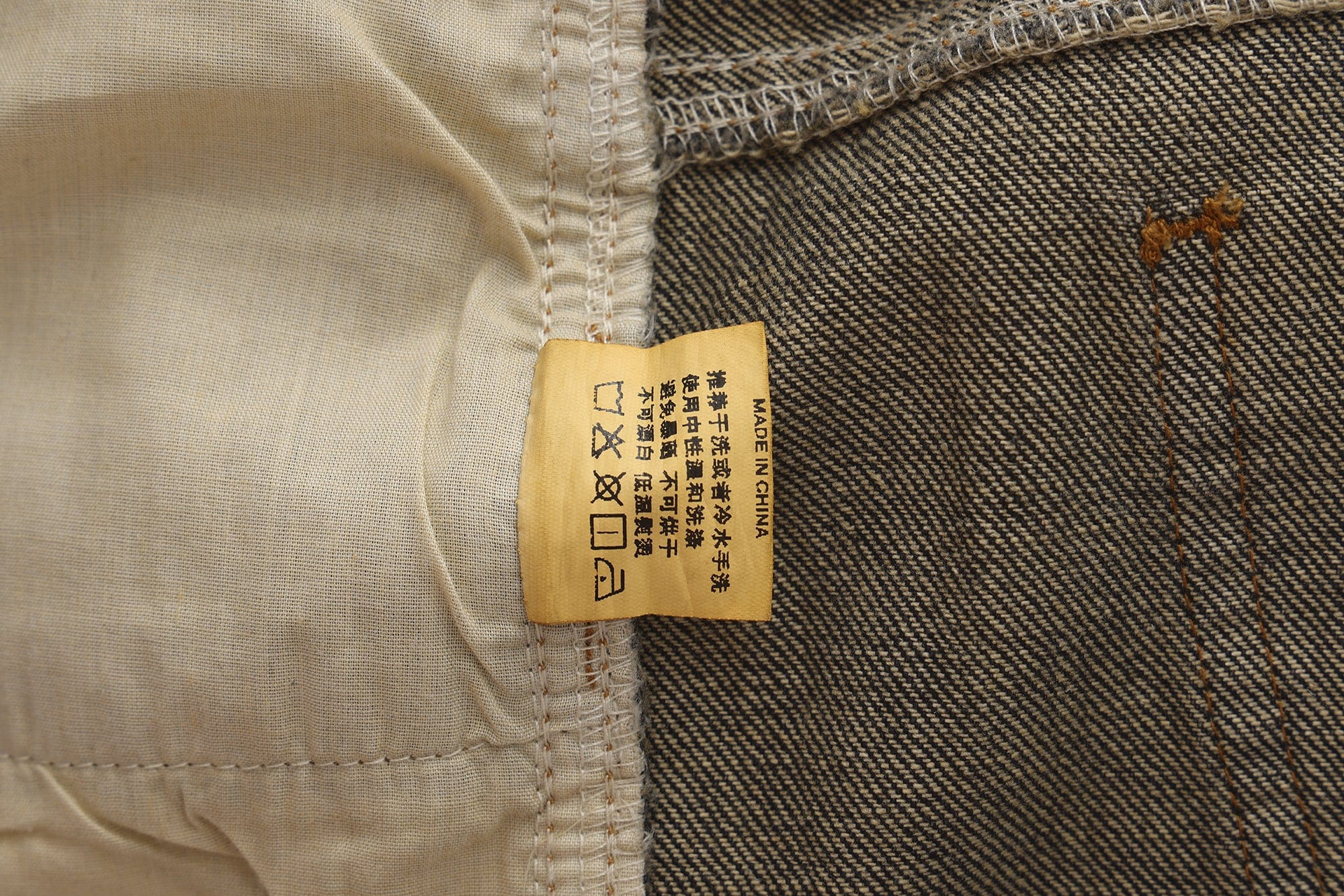 FAYCHUI Washed Whiskered Rhinestone Jeans