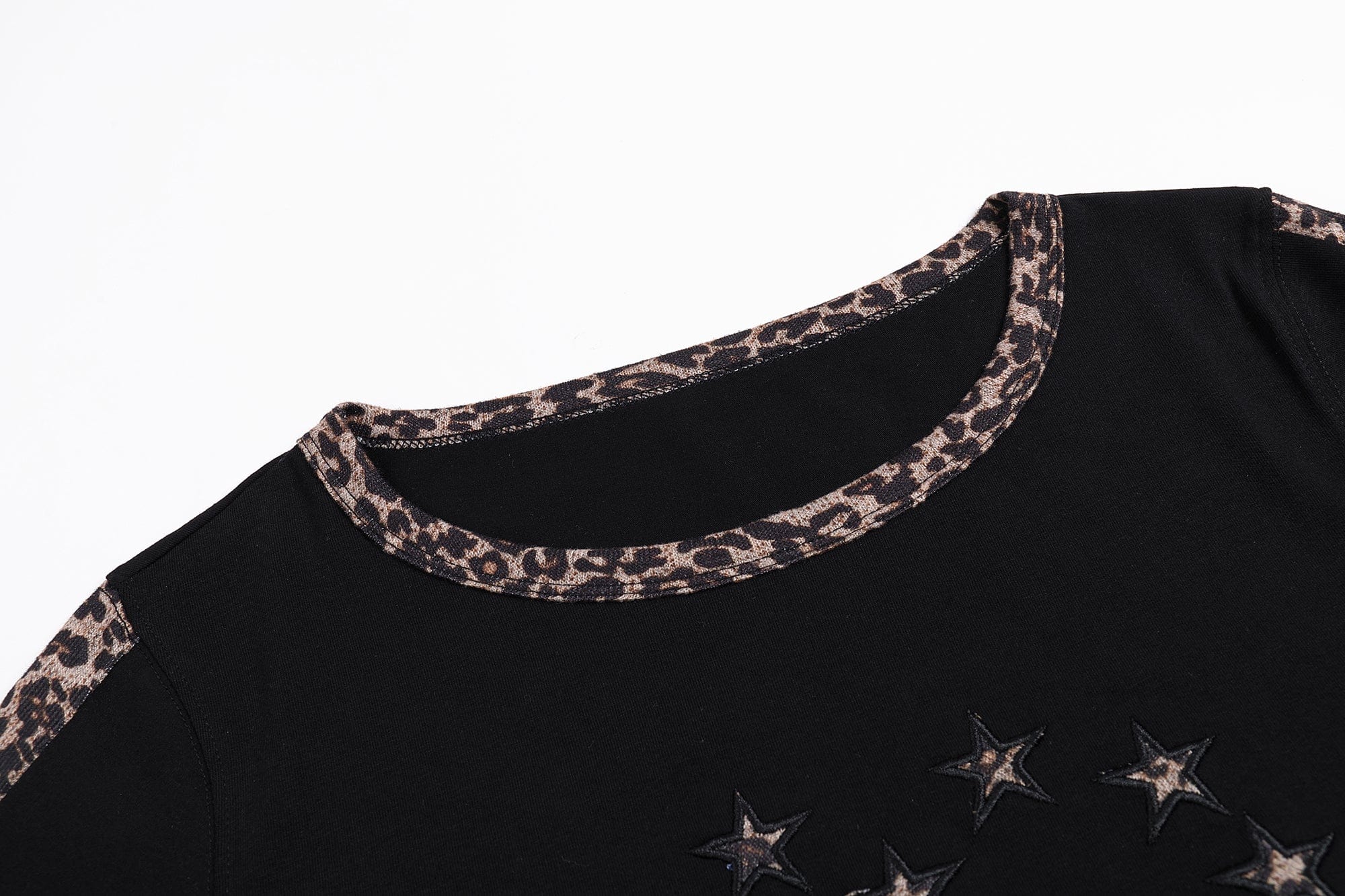 FAYCHUI Leopard Trim Cross-Star Graphic Long Sleeve Tee