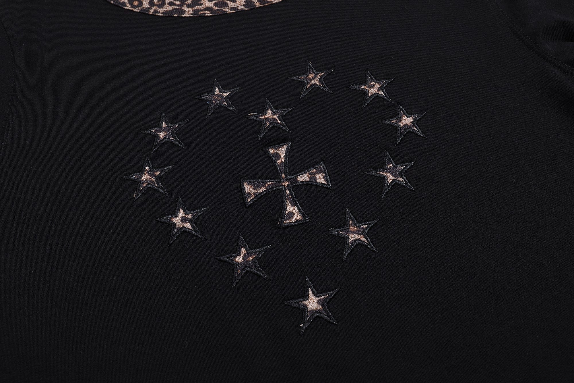 FAYCHUI Leopard Trim Cross-Star Graphic Long Sleeve Tee
