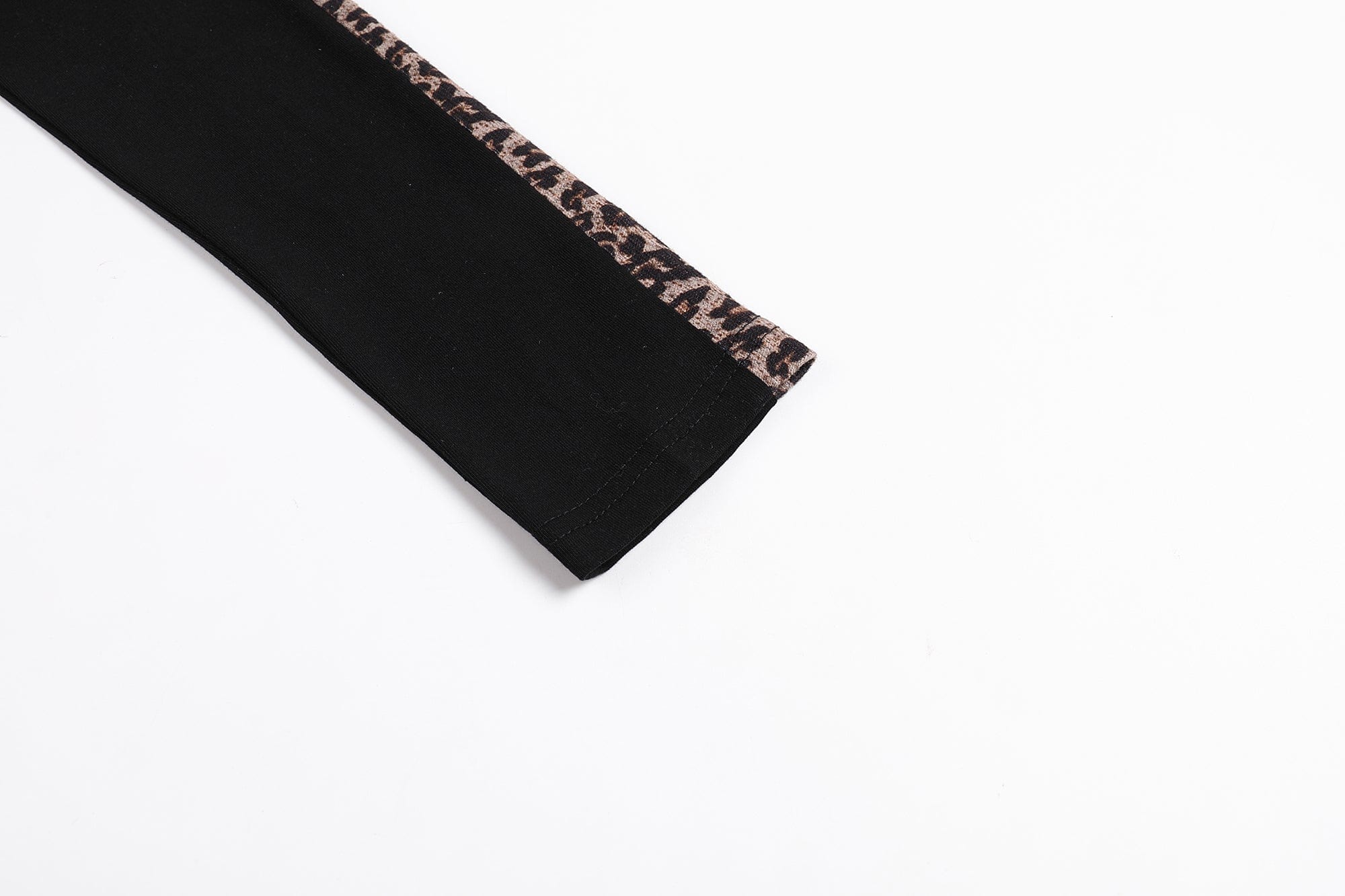 FAYCHUI Leopard Trim Cross-Star Graphic Long Sleeve Tee