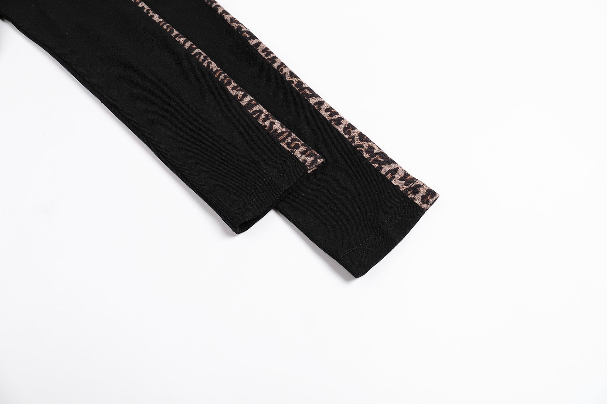 FAYCHUI Leopard Trim Cross-Star Graphic Long Sleeve Tee