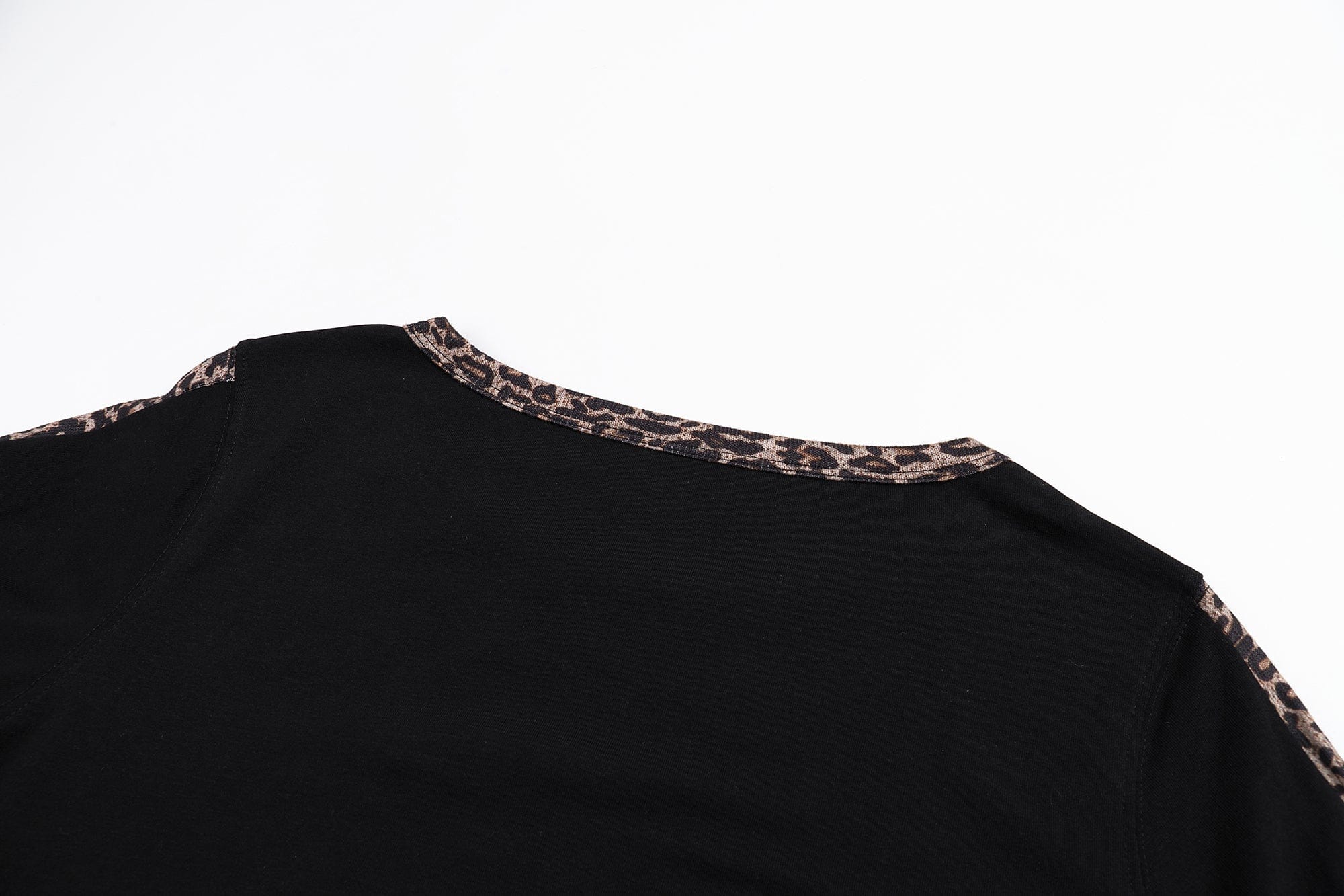 FAYCHUI Leopard Trim Cross-Star Graphic Long Sleeve Tee