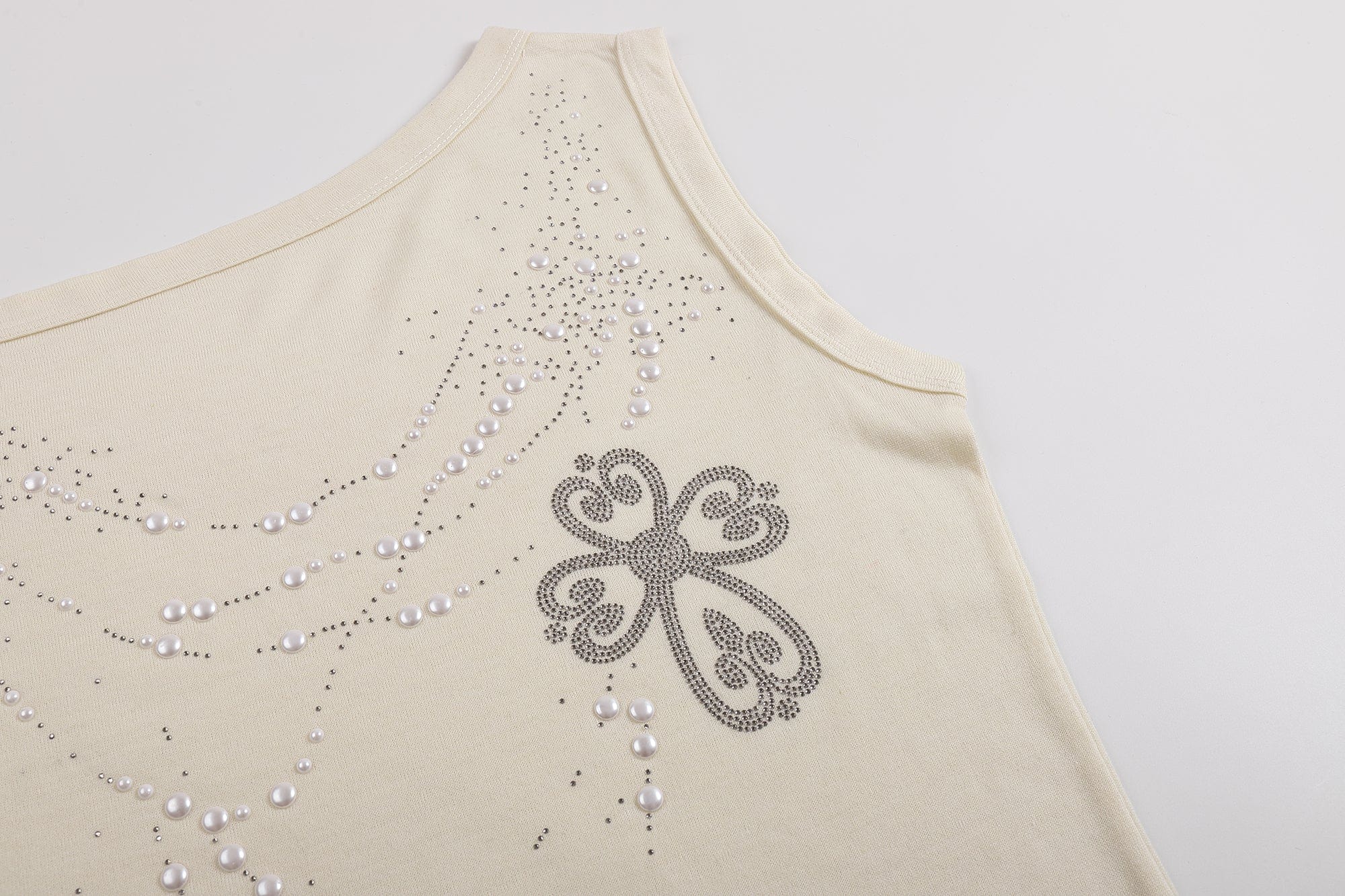 FAYCHUI Asymmetrical Pearl Studded Tank Top
