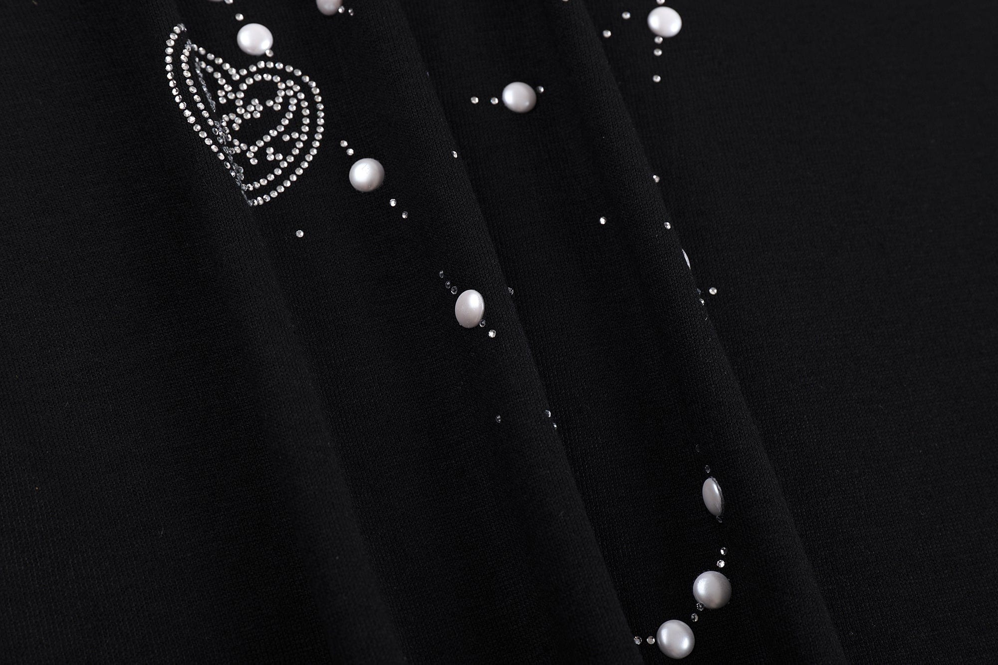 FAYCHUI Asymmetrical Pearl Studded Tank Top