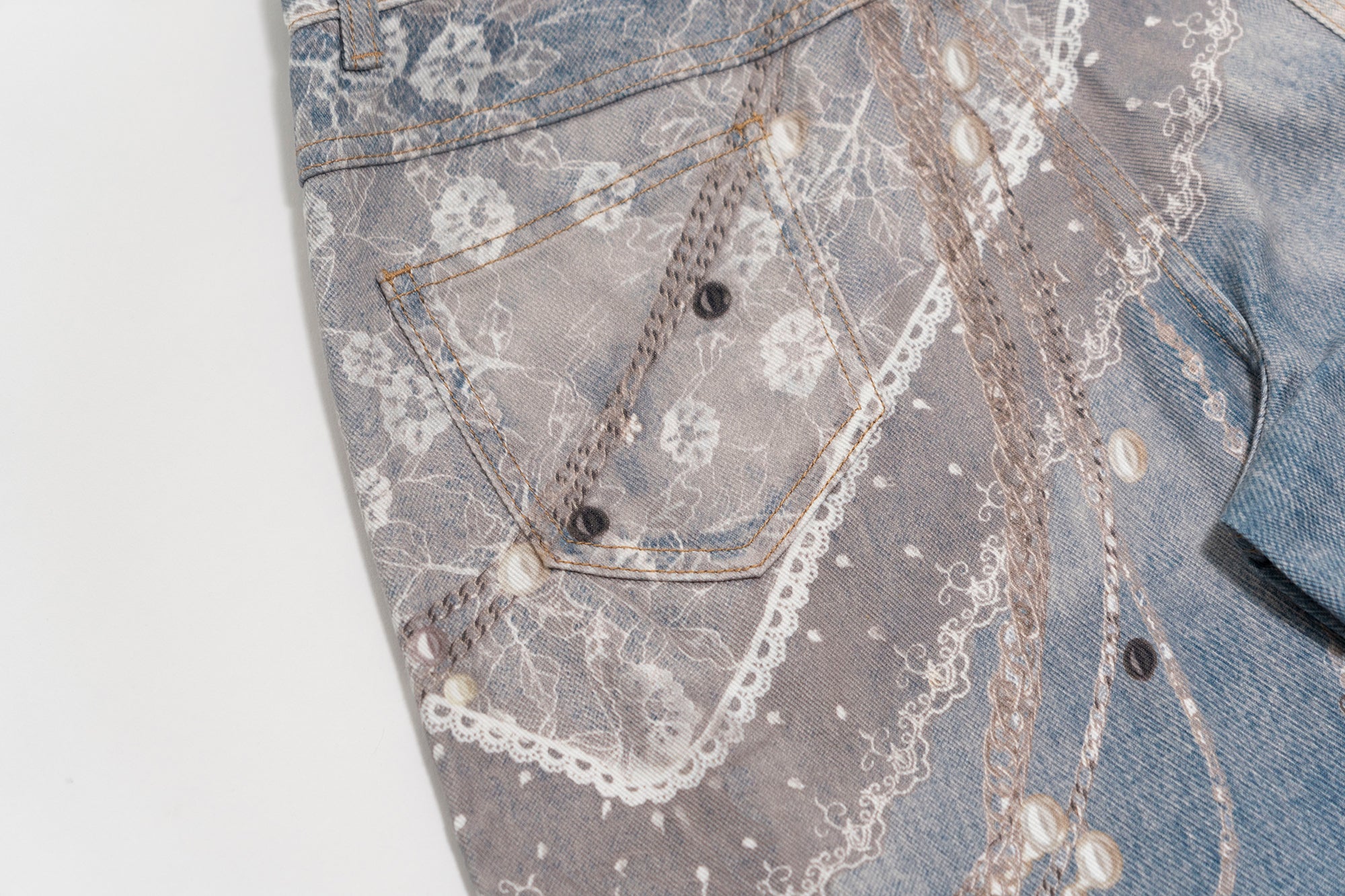 MOF Pearl Chain Graphic Washed Curved Jeans