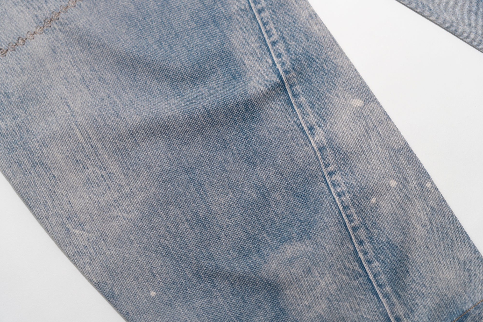 MOF Pearl Chain Graphic Washed Curved Jeans