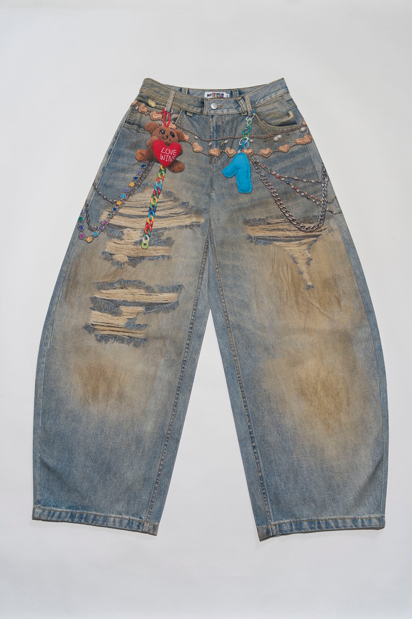 MOF Teddy Chain Graphic Distressed Curved Jeans