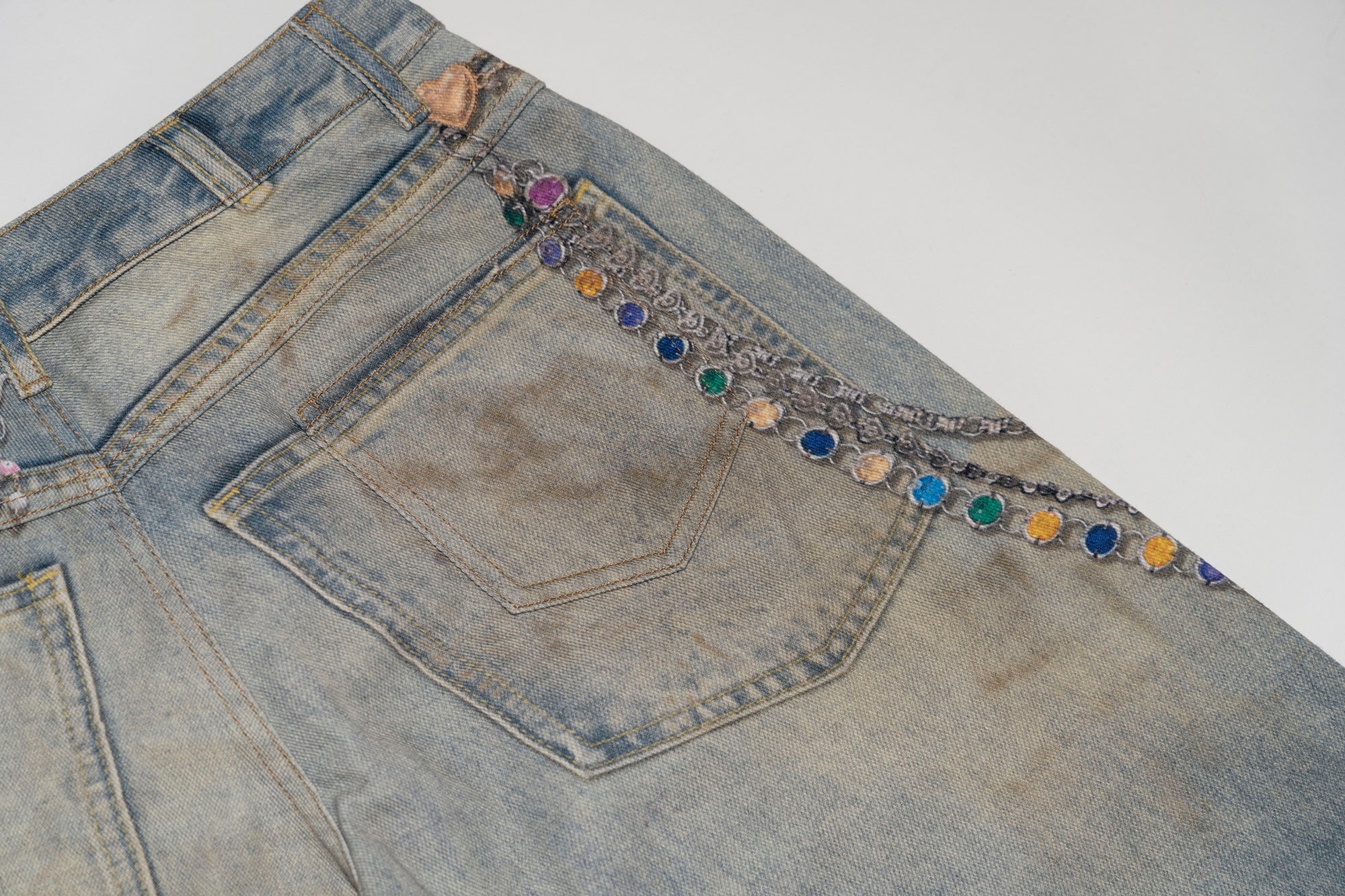 MOF Teddy Chain Graphic Distressed Curved Jeans
