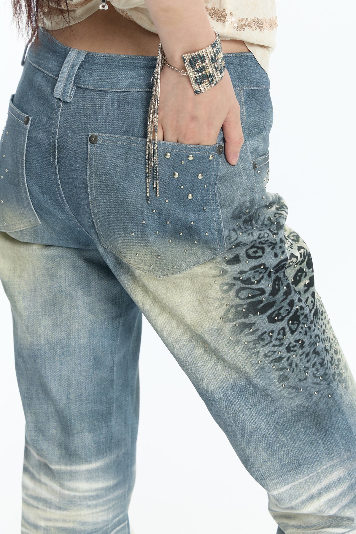FAYCHUI Washed Leopard-Print Distressed Slim Flared Jeans