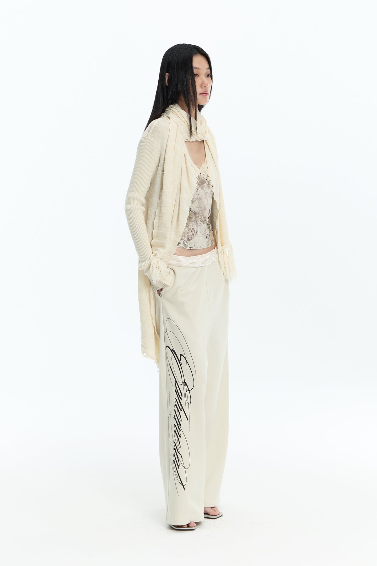 FAYCHUI Graphic Lace-Pocket Wide-Leg Sweatpants Beige