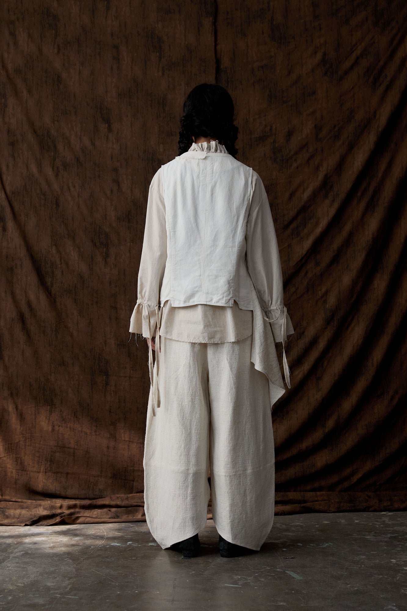 INCH LIM Pleated Split-Hem Curved-Leg Pants