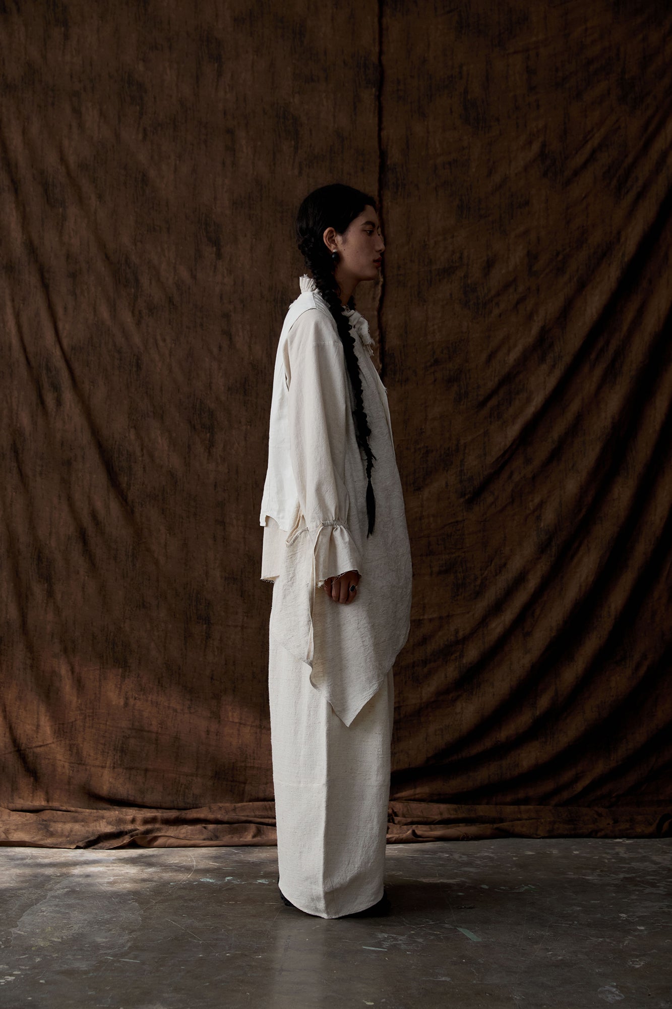 INCH LIM Pleated Split-Hem Curved-Leg Pants