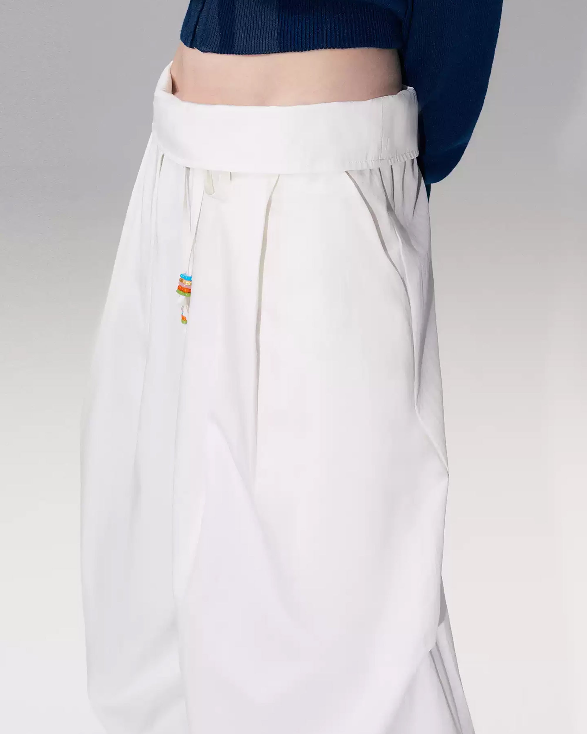 THE NEVERMORE Folded Waist Beaded Drawstring Wide-Leg Pants