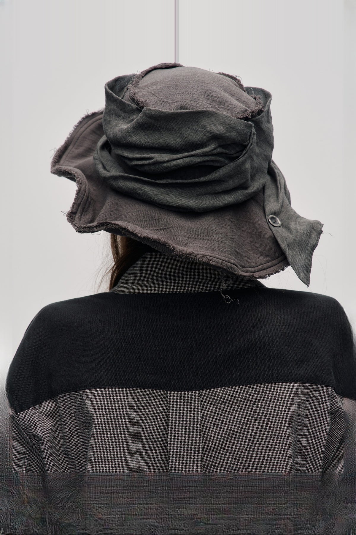 ILNya Nieternite Nifutur Frayed Raw-Edge Wide-Brim Structured Flat Top Hat — half body