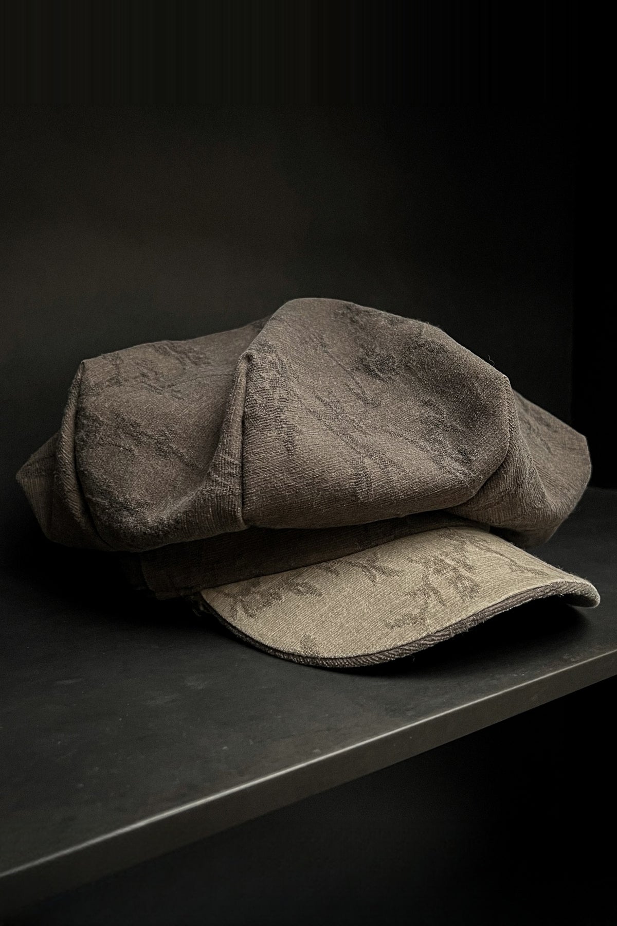 ILNya Nieternite Nifutur Retro Patterned Newsboy Cap — flat lay