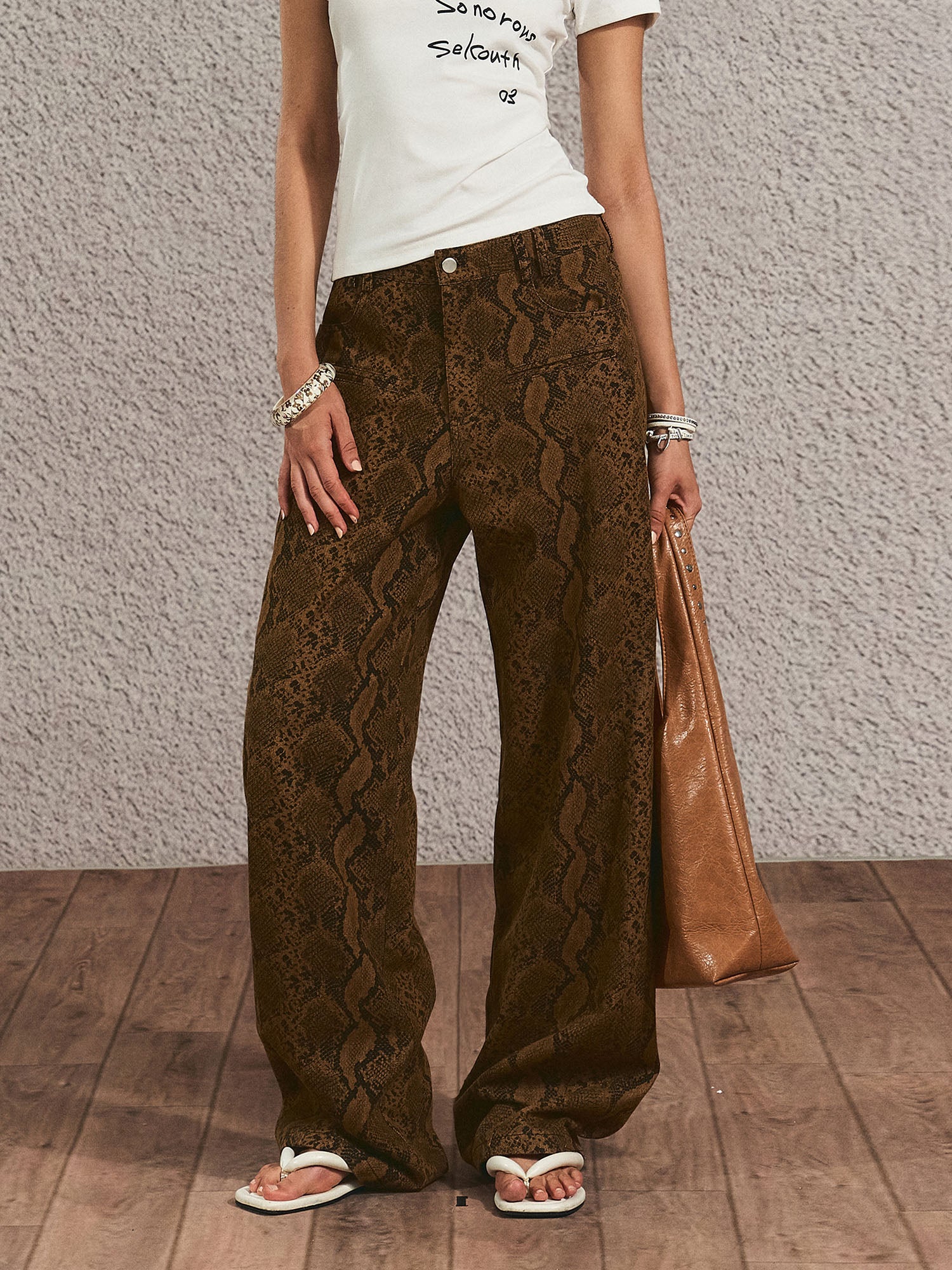 THE NEVERMORE Serpentine Buckled Wide-Leg Pants