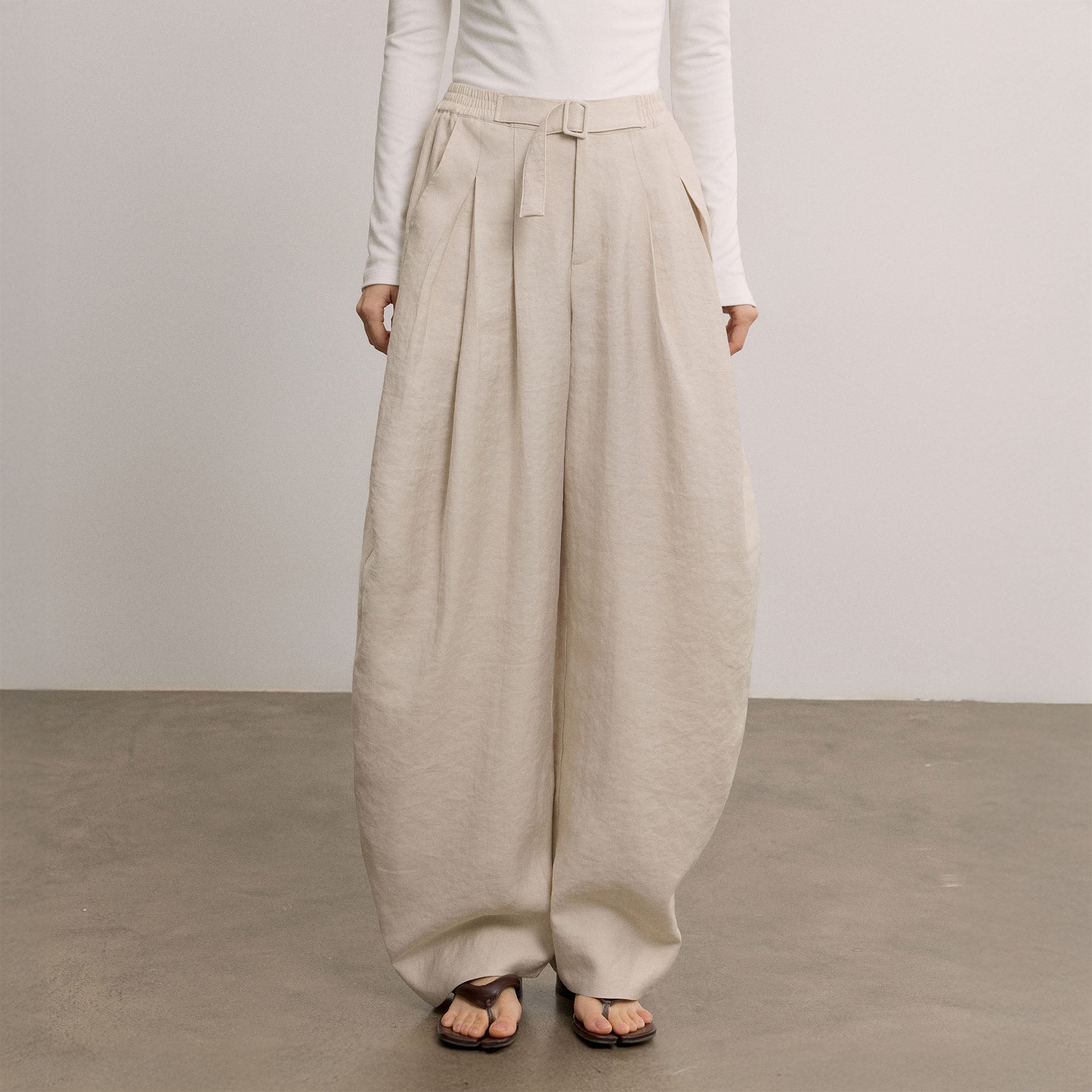 SAME FLOW Belted Pleated Oversized Barrel Pants