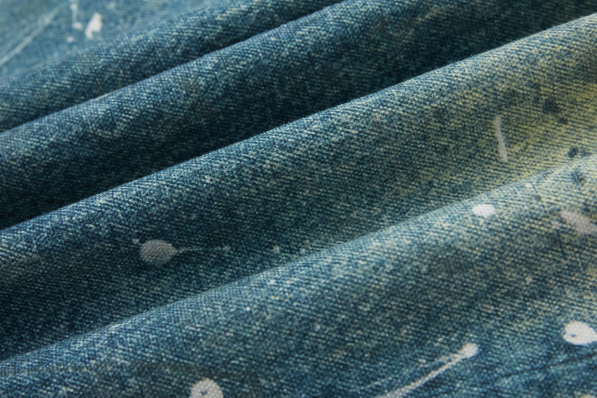 SOFITTE Charm Graphic Splatter Wrinkle-Washed Jeans