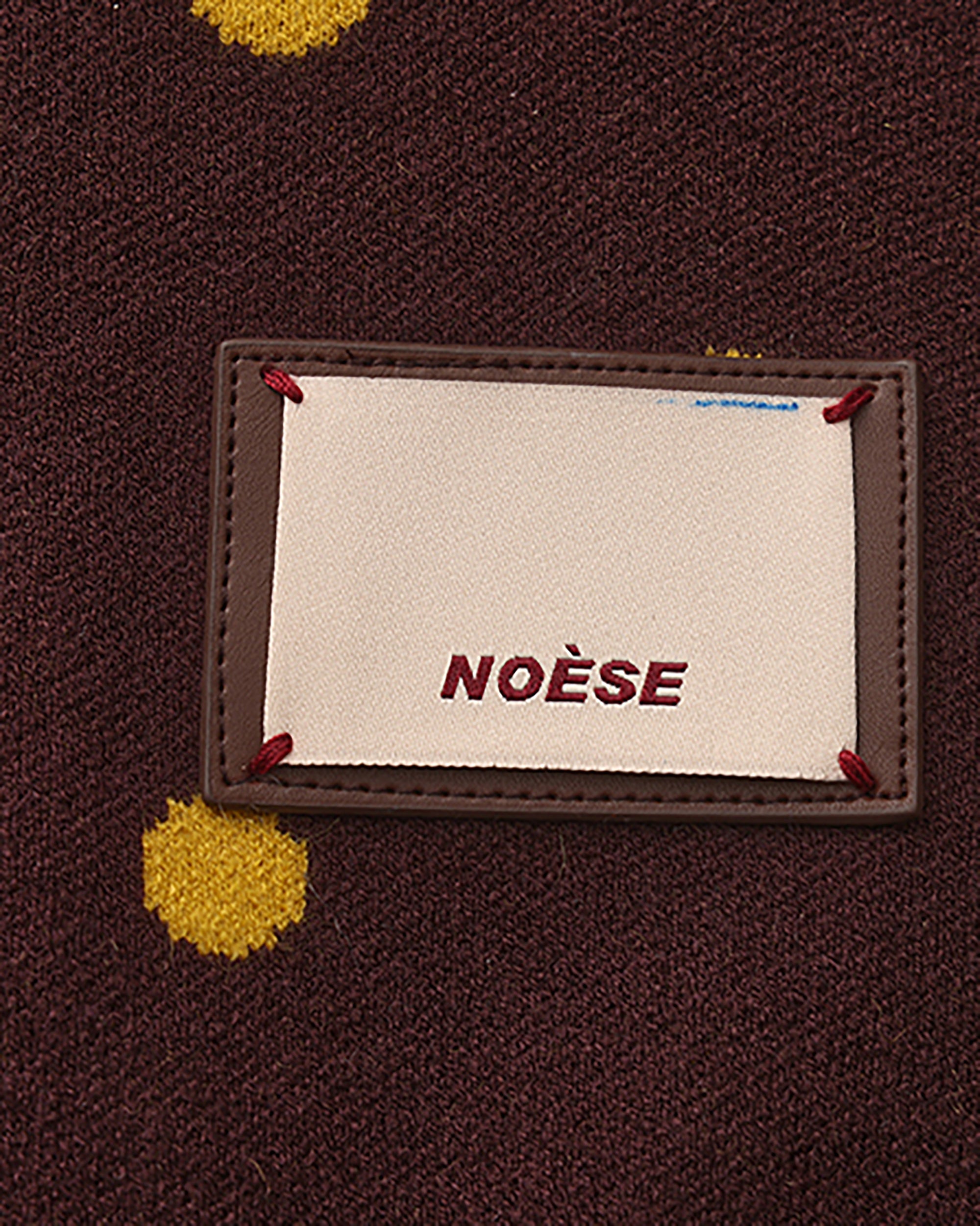 NOESE Contrast Dot Tie-Neck Zip-Up Cardigan