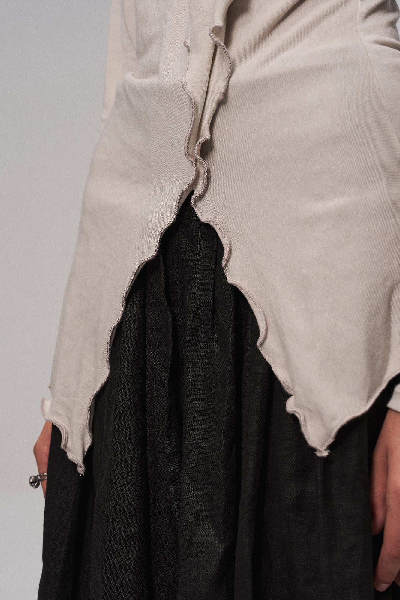 ILNya Nieternite Nifutur Asymmetrical Ruffle Wool-Blend Long Sleeve Tee