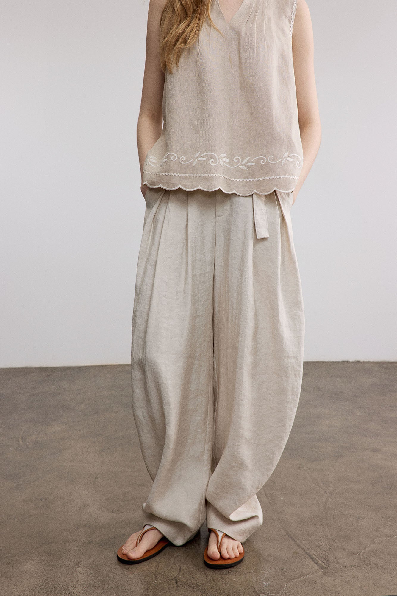 SAME FLOW Belted Pleated Oversized Barrel Pants