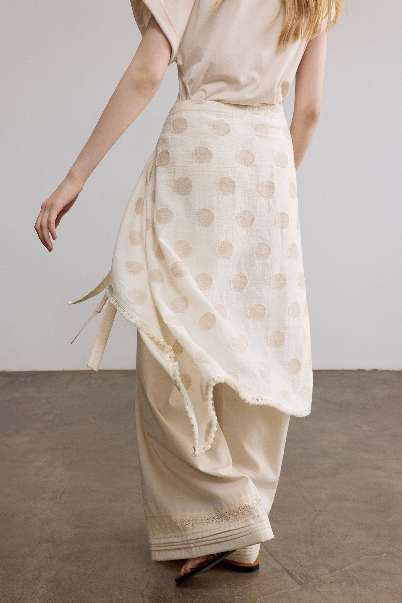 SAME FLOW Asymmetrical Dot Fringe-Trim Tie Skirt