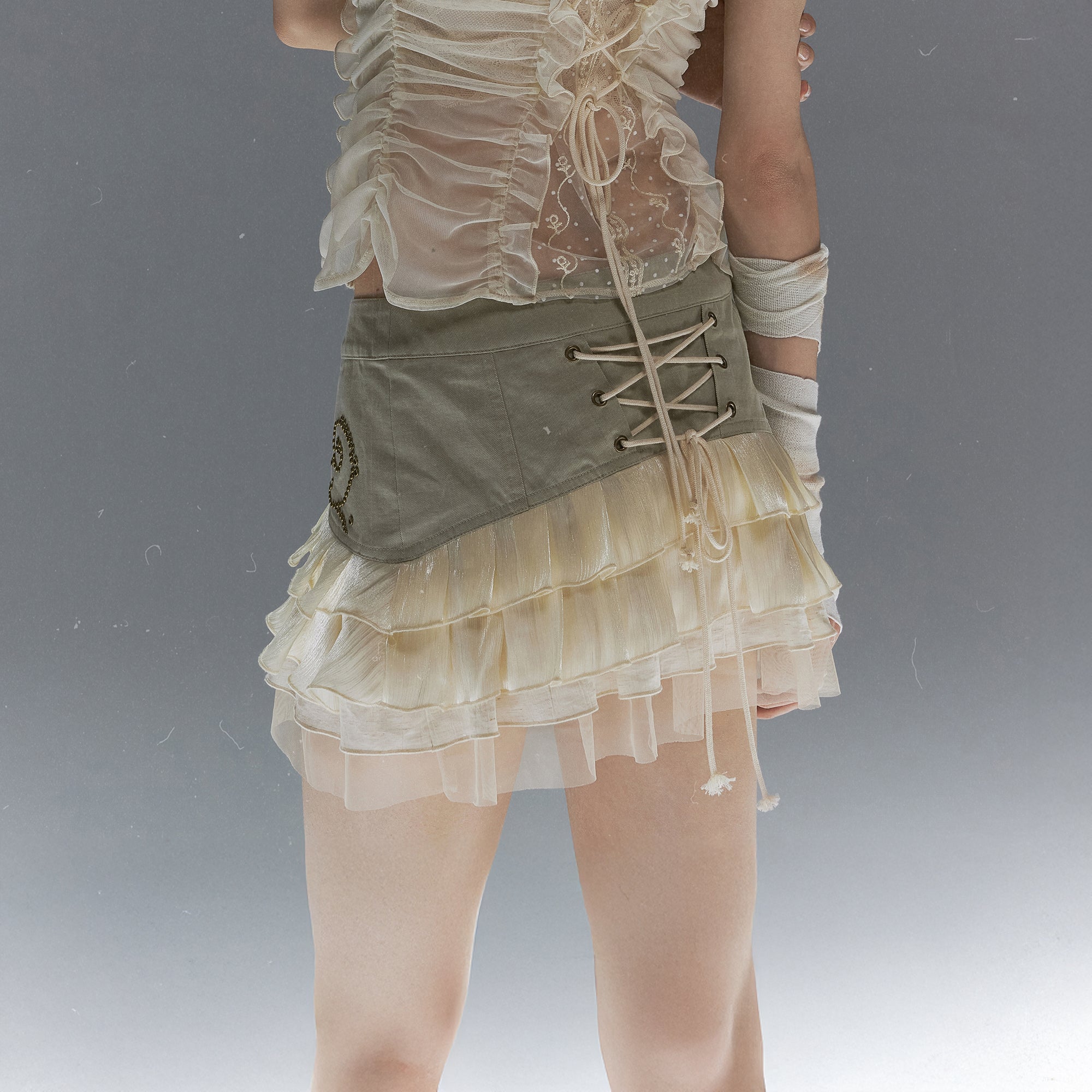 CESTNOUS Scroll-Embellished Layered Ruffle Mini Skirt